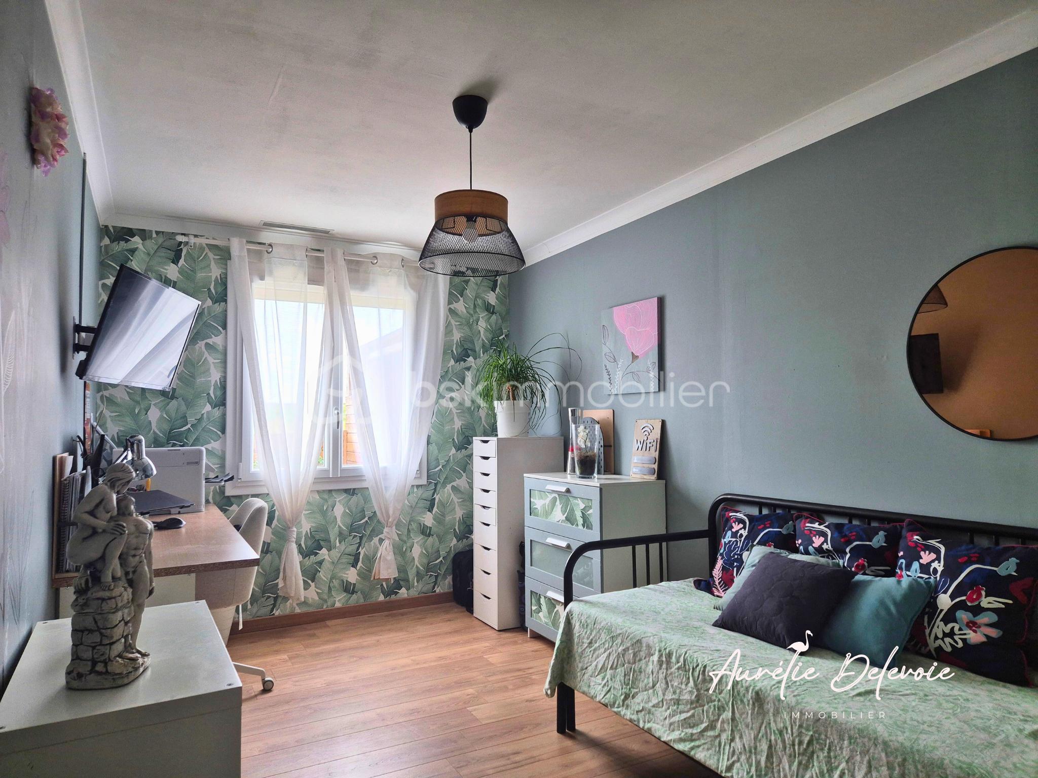 Maison traditionnelle de 135 m² - Chbre - bureau.png