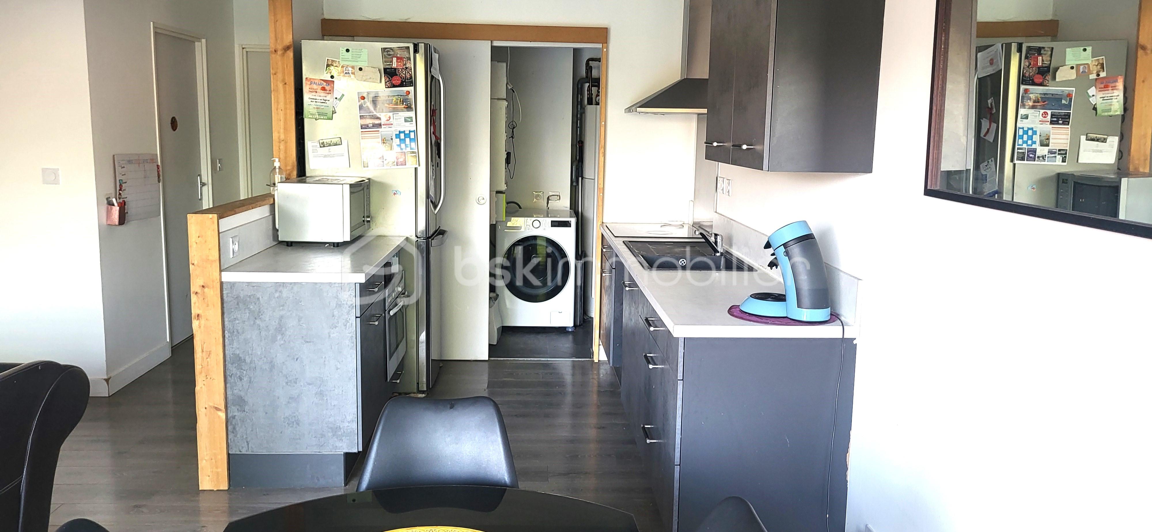 Maison de 81 m² - cuisine avec buanderie.jpg