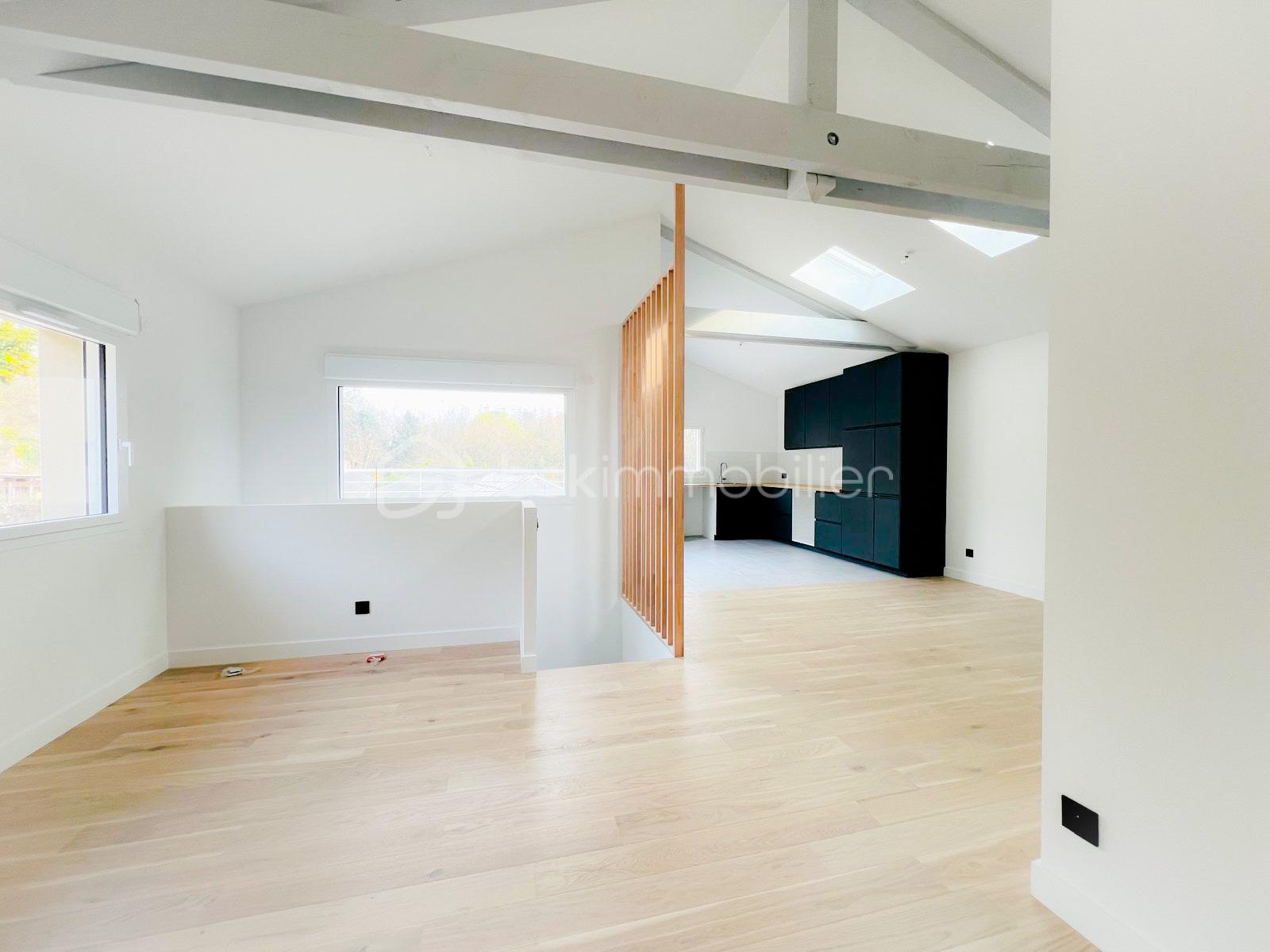 Maison de 97,03 m² - SEJOUR AVEC CUISINE EN ARRIERE.jpg