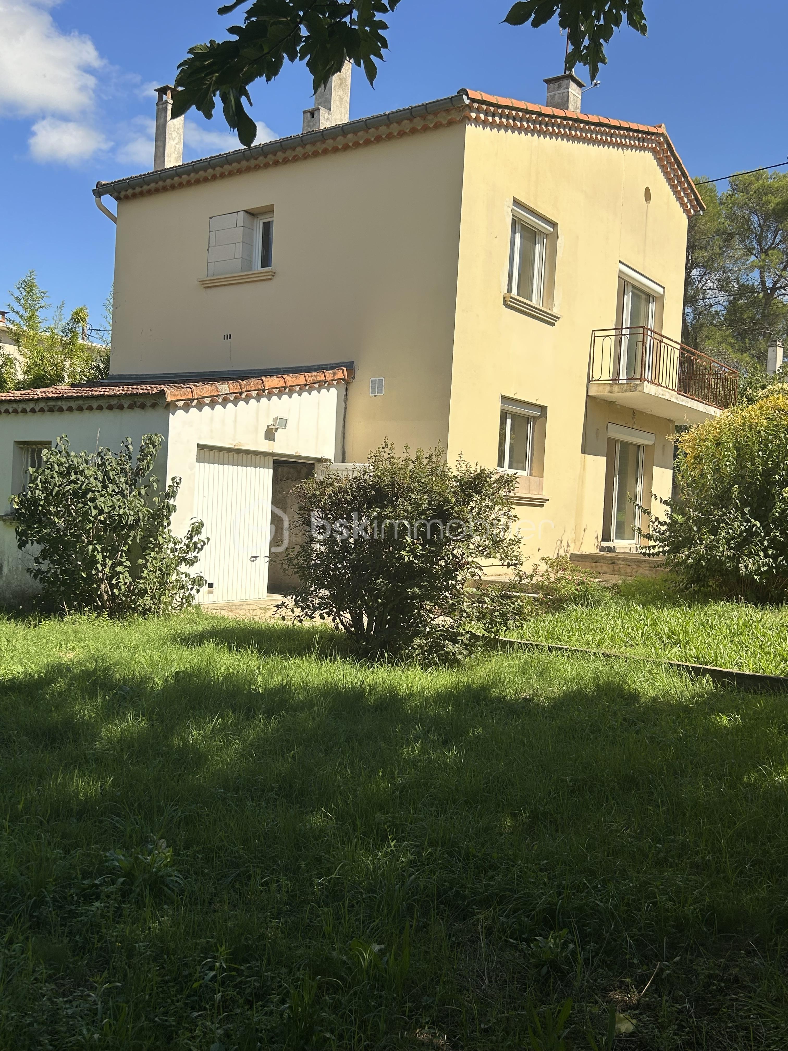 Maison de 85 m² - maison vue du jardin.jpg