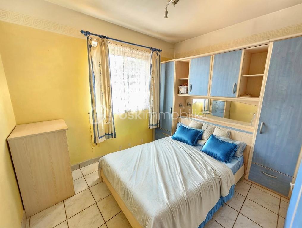 Maison traditionnelle de 124 m² - 1c144ef7ee79282-1.jpg