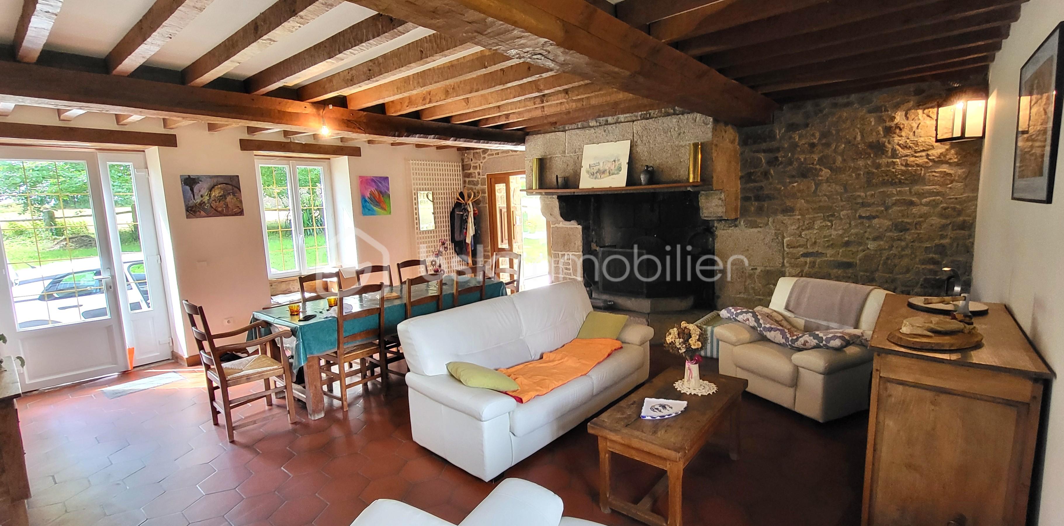 Maison longere de 165 m² - HUET Roger séjour vers véranda 1.jpg