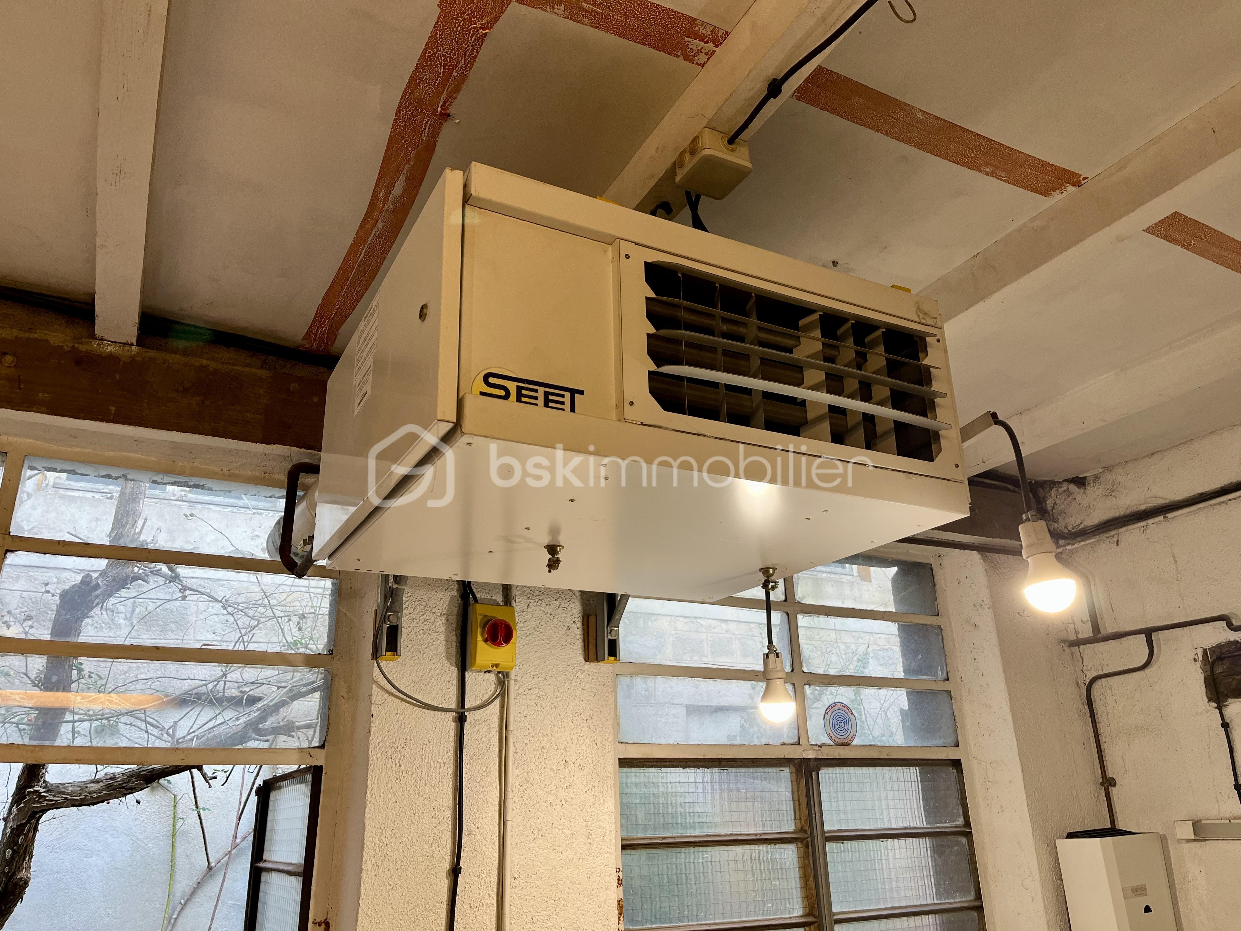 Immeuble de 56,60 m² - 9-chaufage pro gaz air propulsé.jpeg