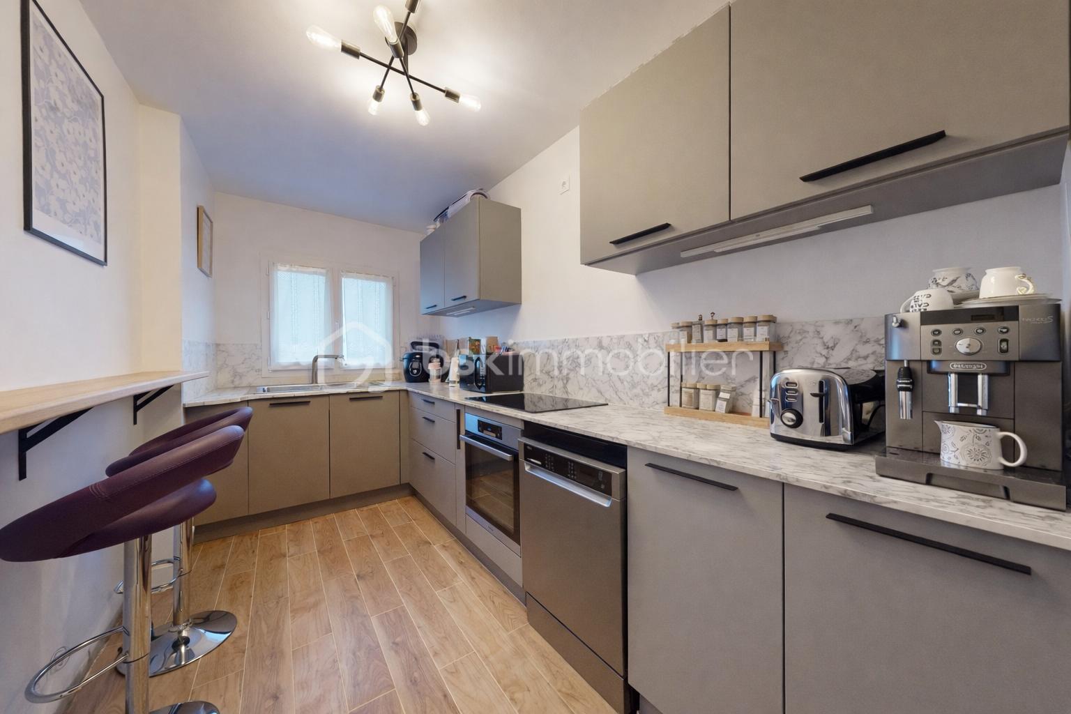 Appartement de 76,90 m² - Cuisine.png