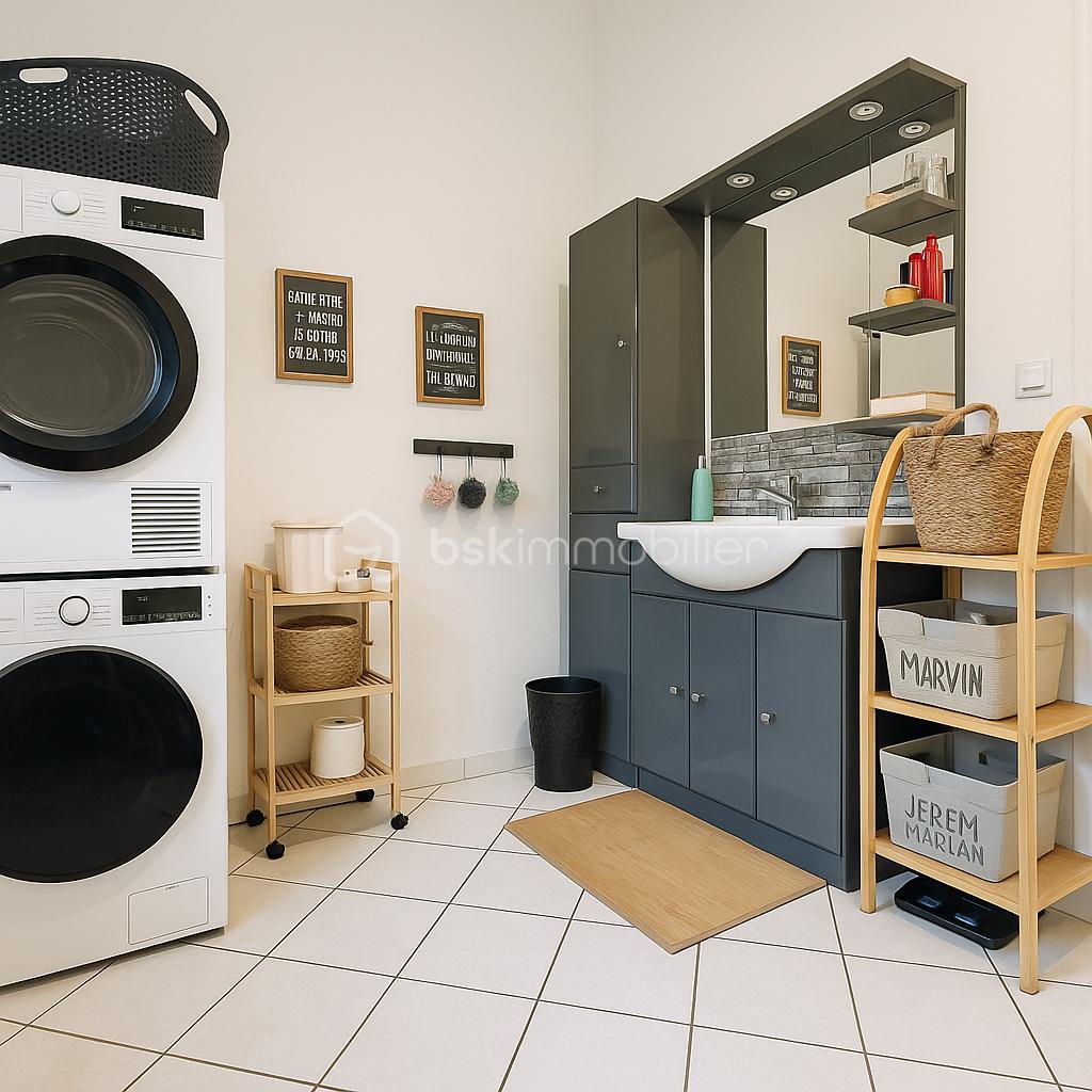 Duplex de 122 m² - Salle de bain et buanderie organisée.png