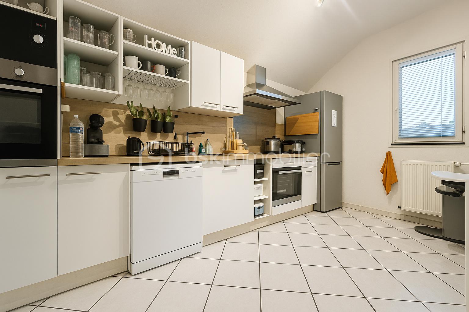 Duplex de 122 m² - Cuisine moderne et lumineuse(3).png