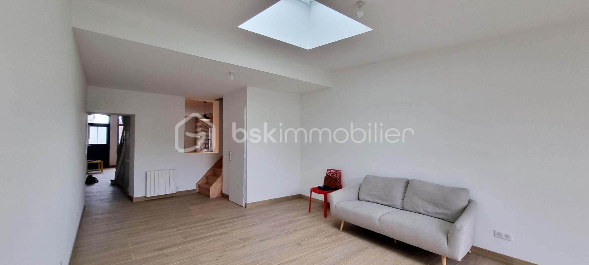 Maison de 130 m² - salon cote rue.jpg