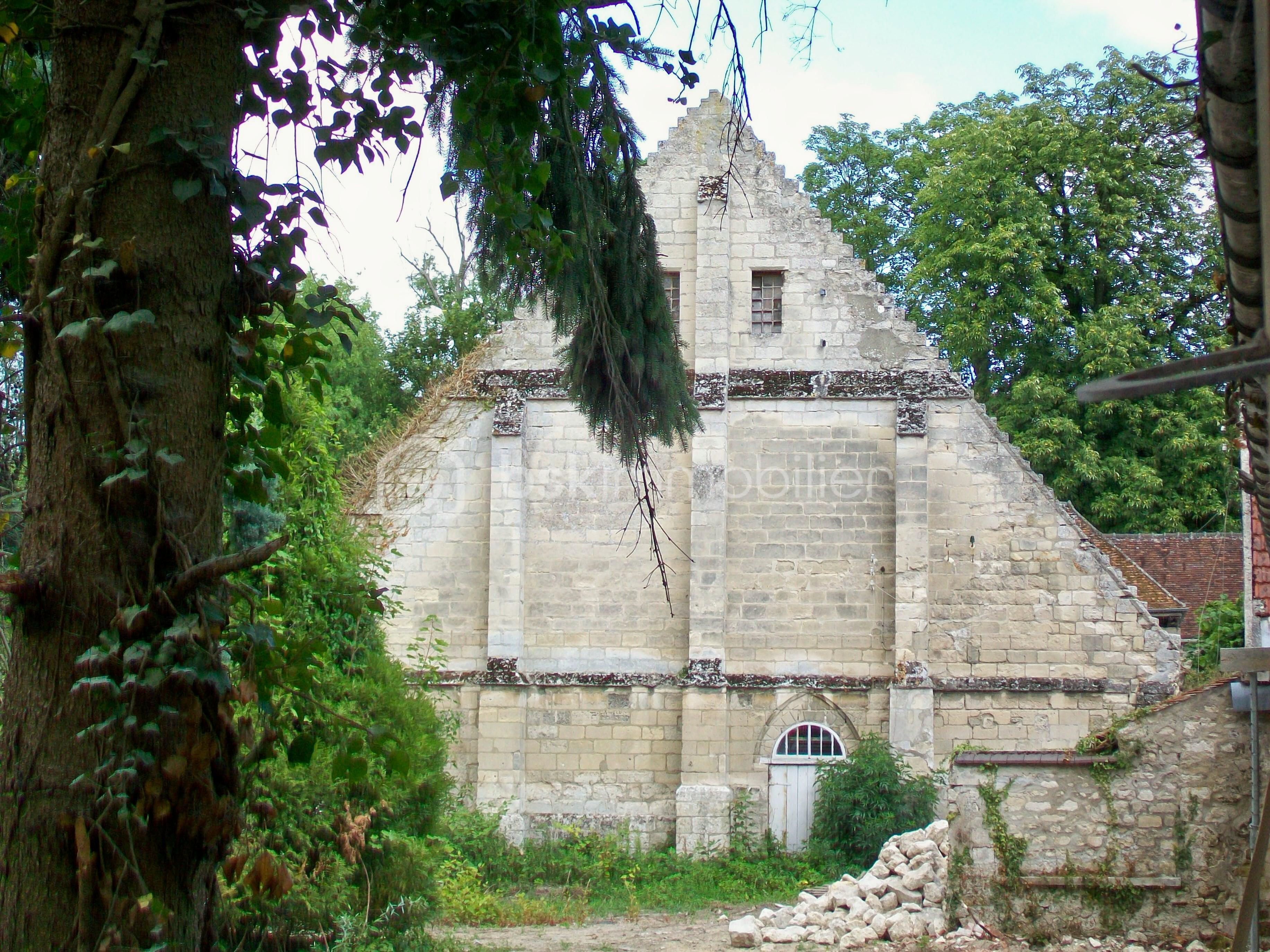 Immeuble mixte de 496 m² - grange_aux_dîmes_pignon_ouest.jpg