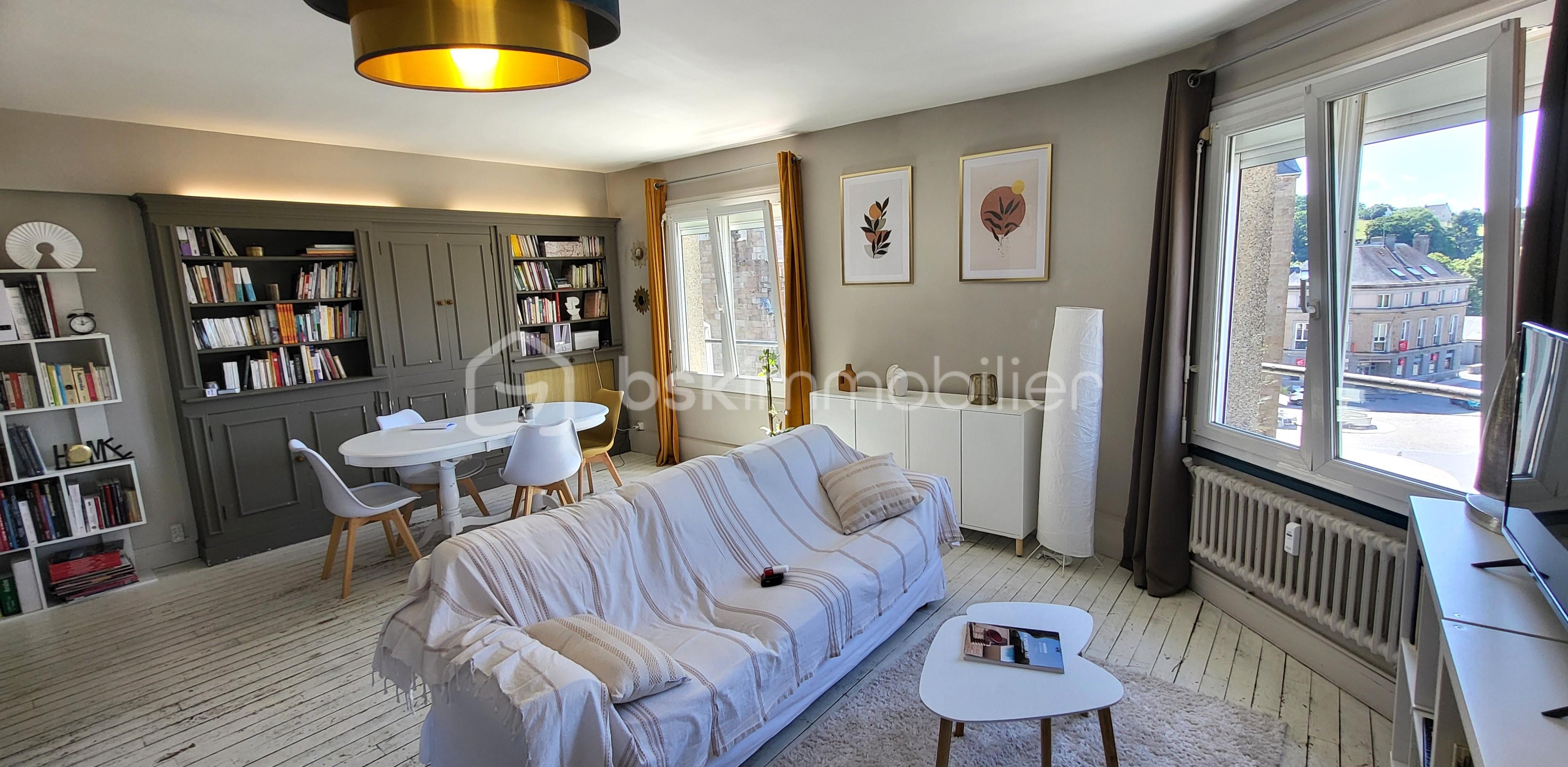 Appartement de 98,30 m² - KARIM salon et salle ple vers église.jpg