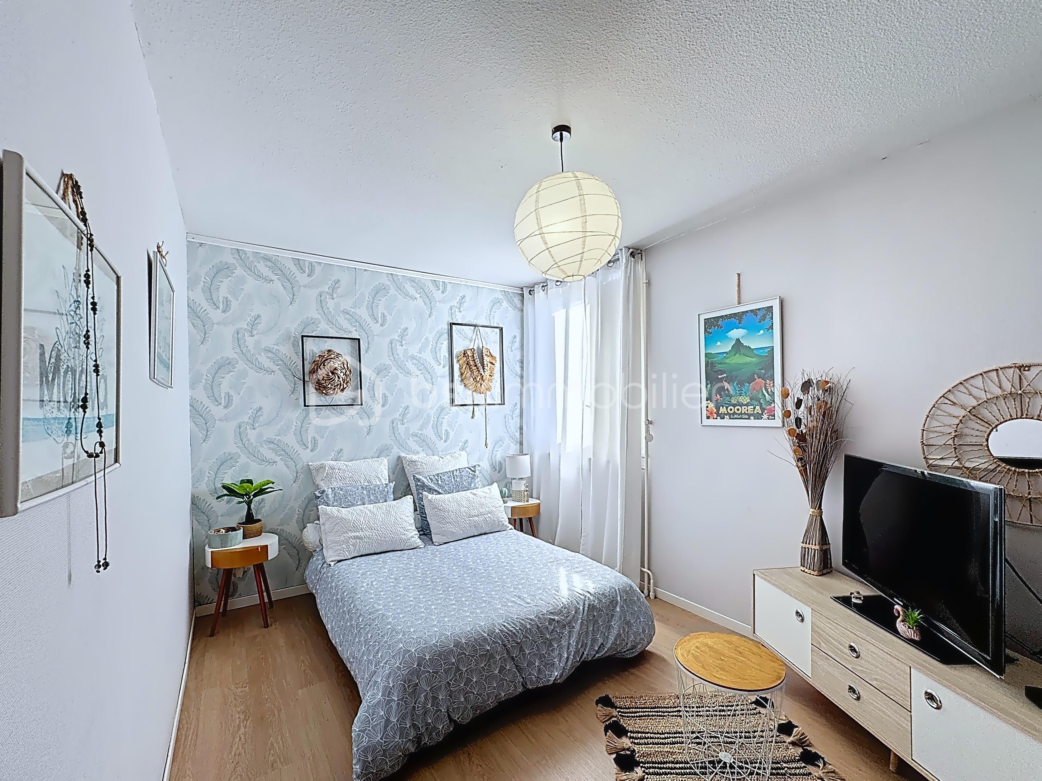 Appartement de 65,99 m² - 902526747b4100a0fd3a9d53ee9366f1.png