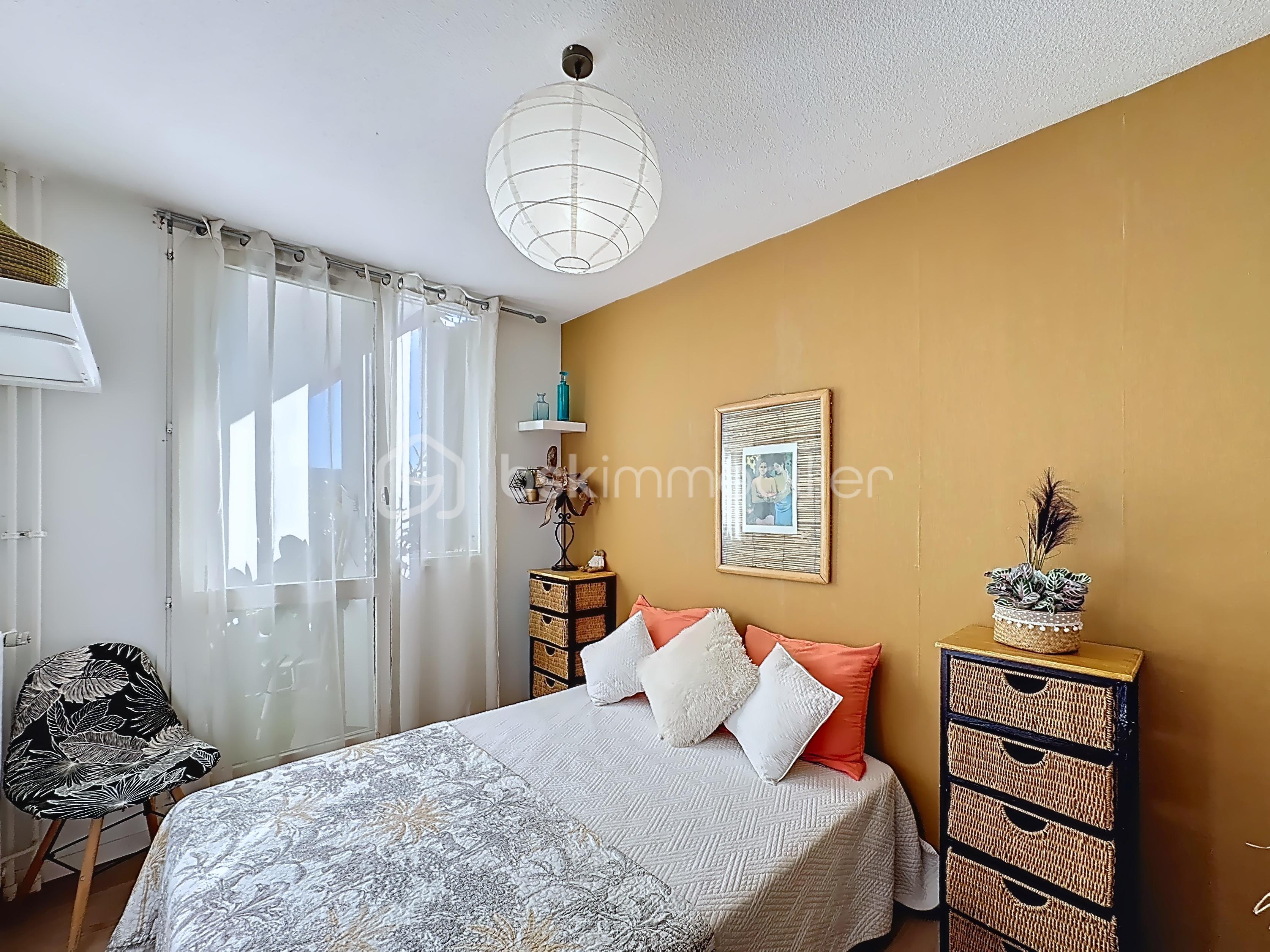 Appartement de 65,99 m² - 898bd87da55752916a93b7b1a70c161a.png