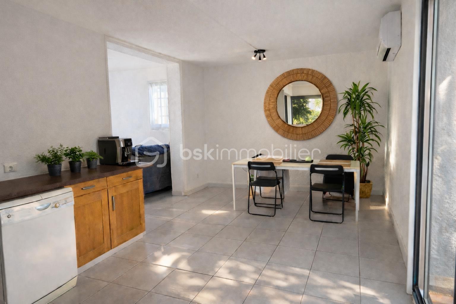 Modern open-concept dining and kitchen space.png