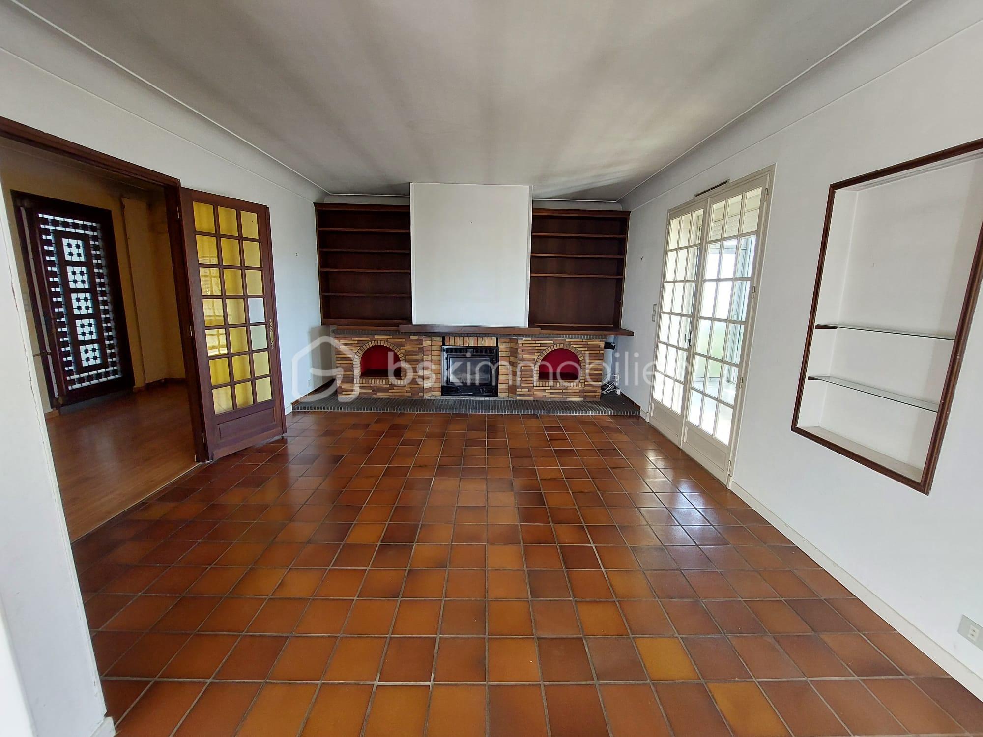 Maison traditionnelle de 300,40 m² - cheminée.jpeg