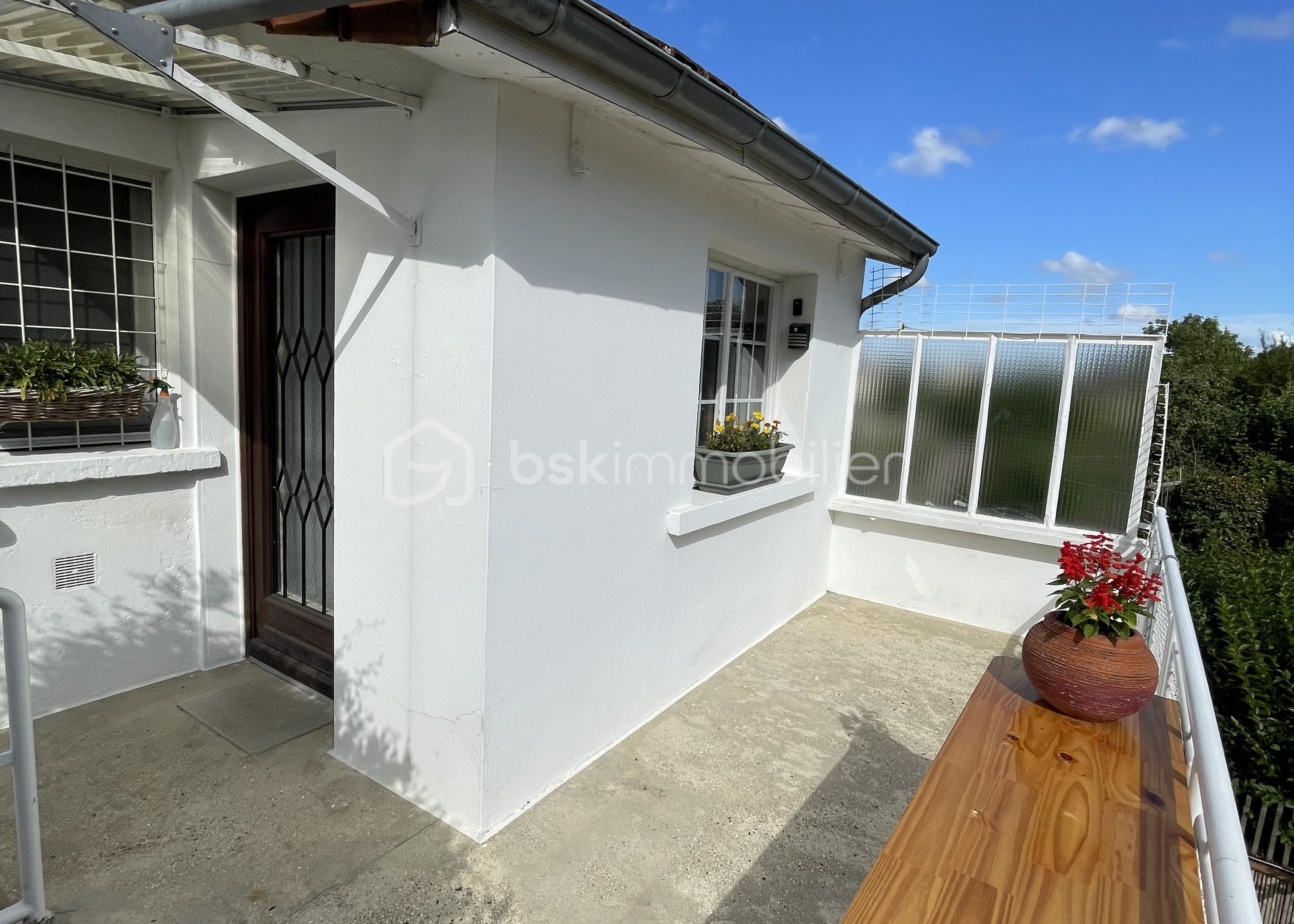 Pavillon de 103 m² - 29 Arriere maison balcon.jpg