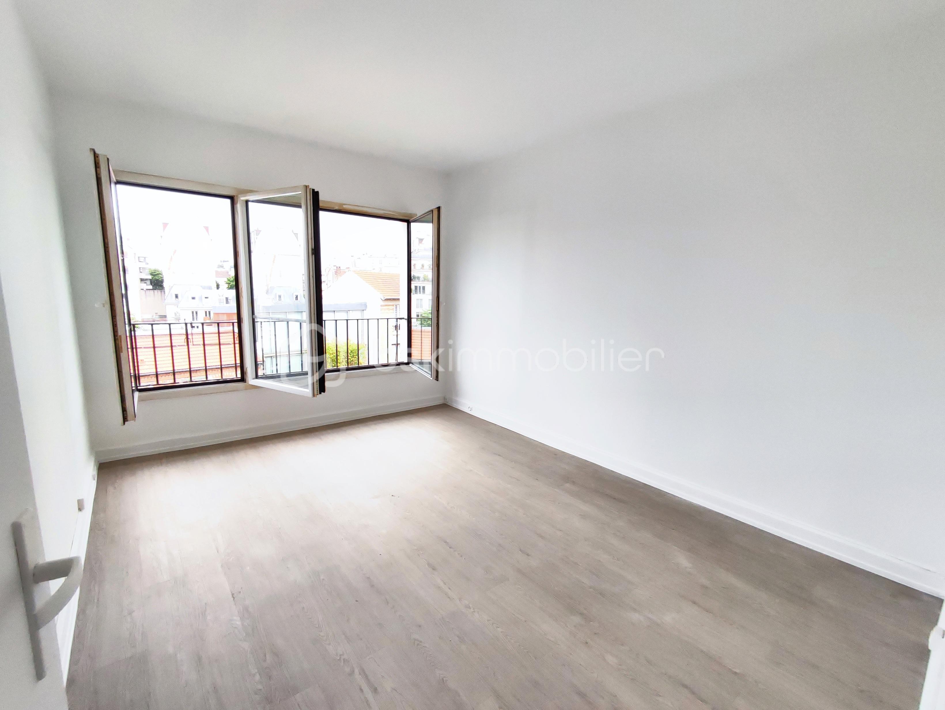 Appartement de 44 m² - Sejour vide vue 1.JPG