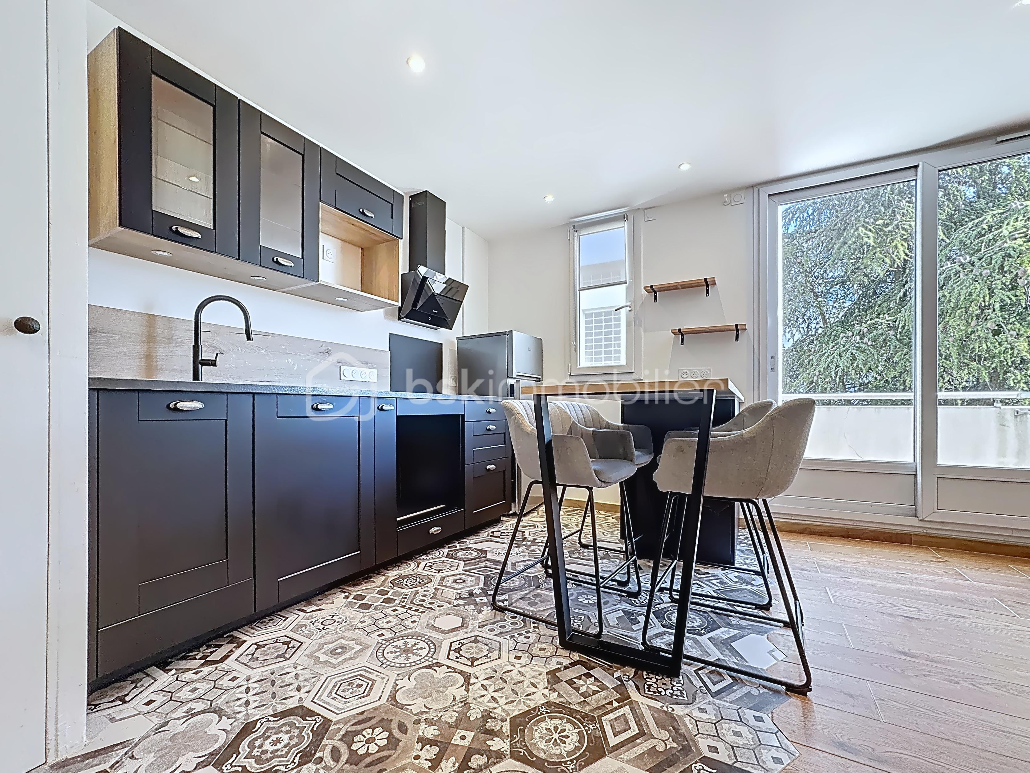 Appartement de 50,46 m² - 93ba60b0230ab4ab30911327bd16248c.png