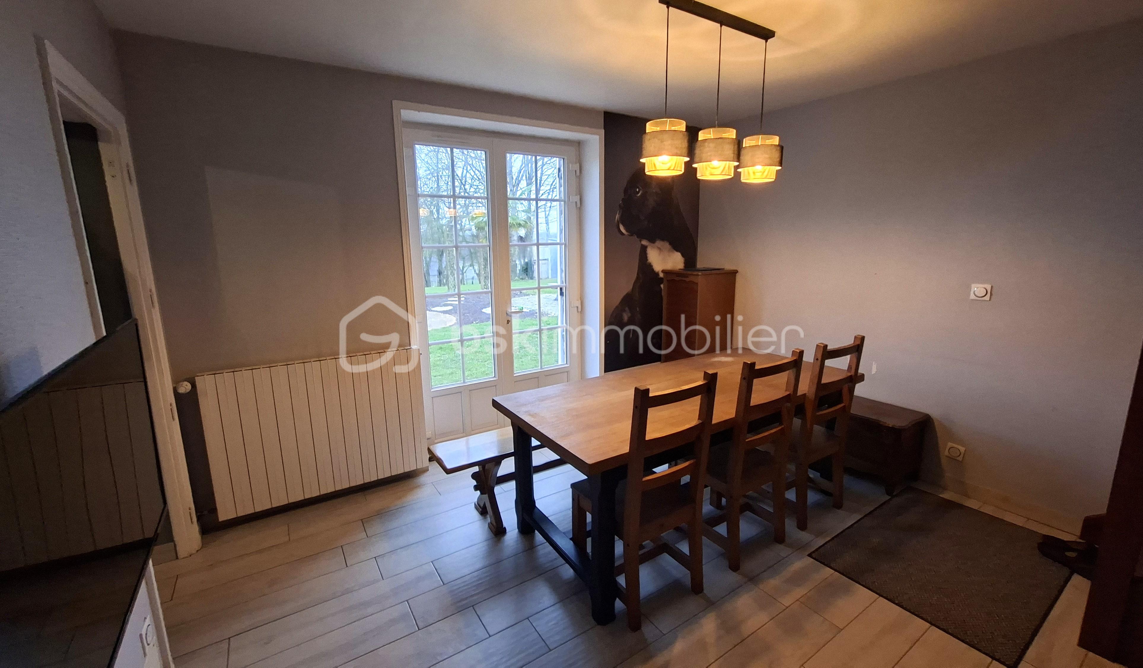 bidel salle a manger vers porte fenetre.jpg