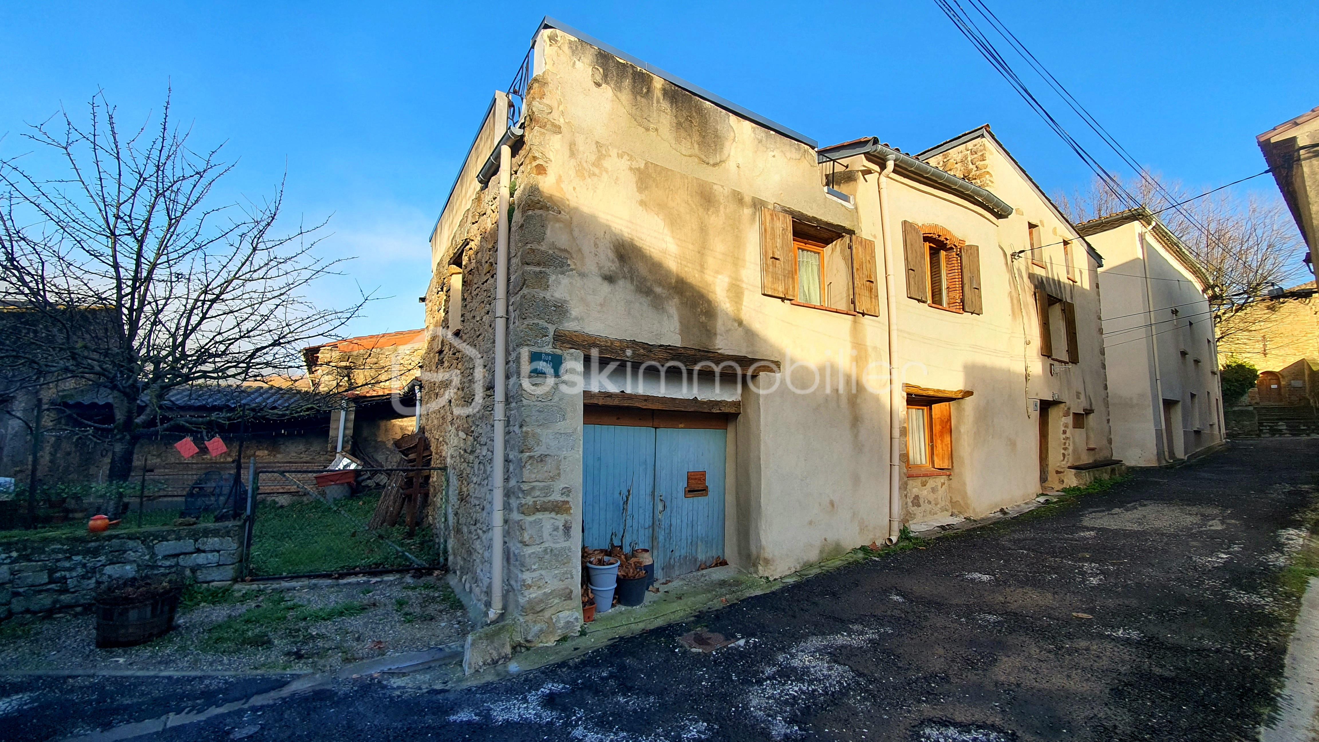 Maison en pierre de 204,80 m²