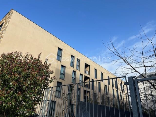 Appartement de 73,80 m² - ARRIERE IMMEUBLE AVEC BALCON.jpg