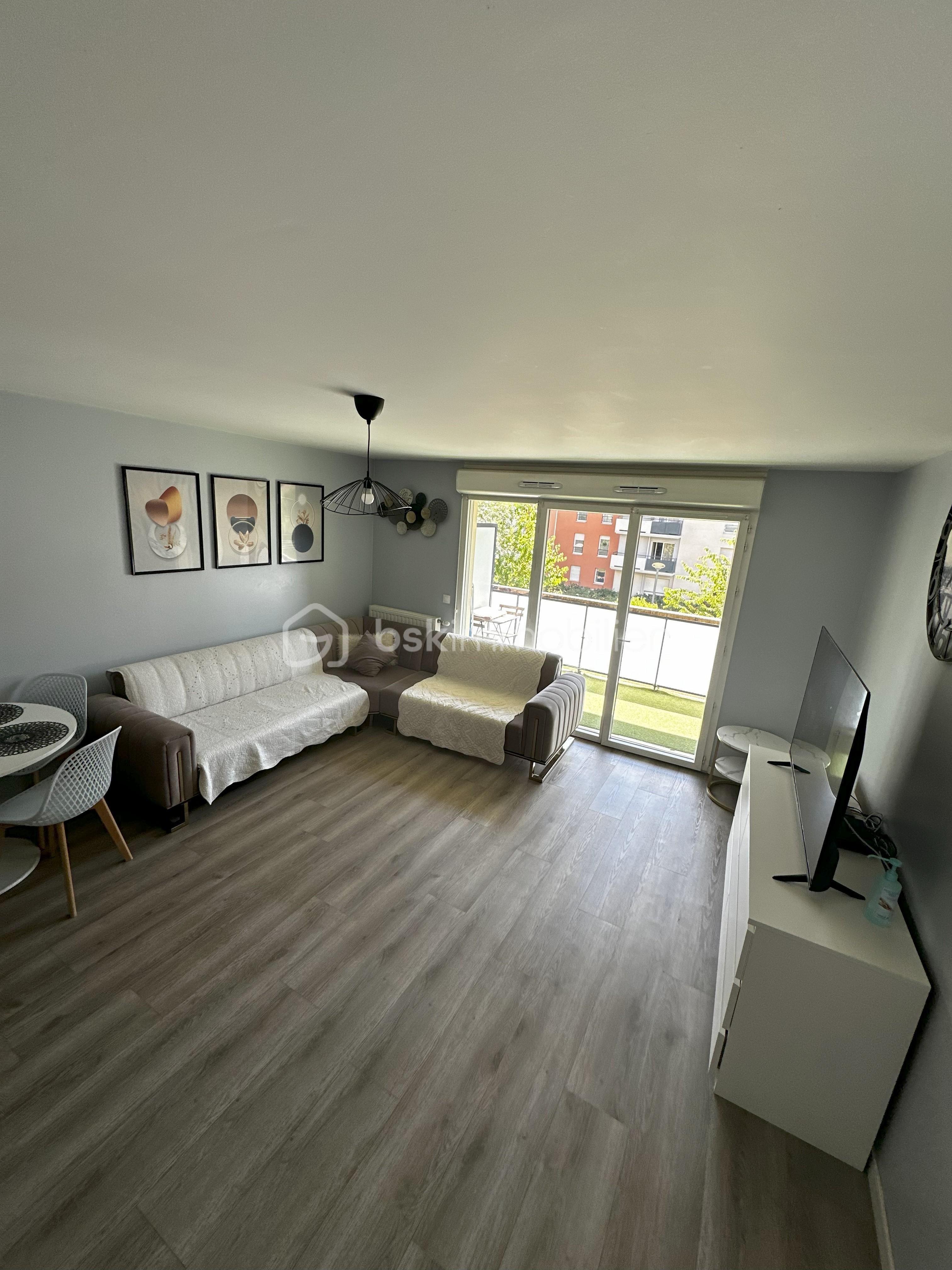 Appartement de 64 m² - CAMARAPHOTOSALON.jpg
