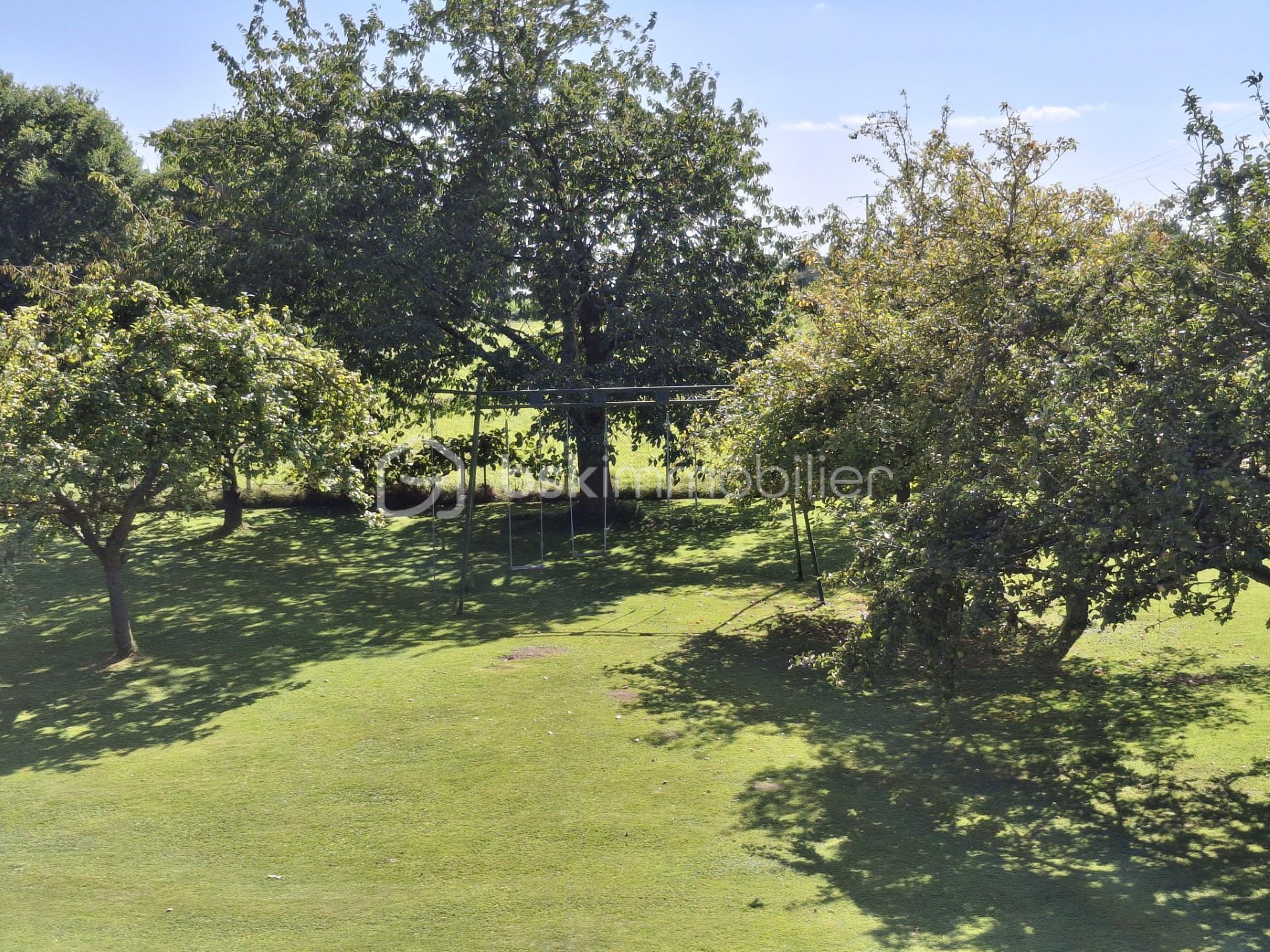 Maison de 120 m² - VUE JARDIN BALANCOIRE PAYSAGE.jpg
