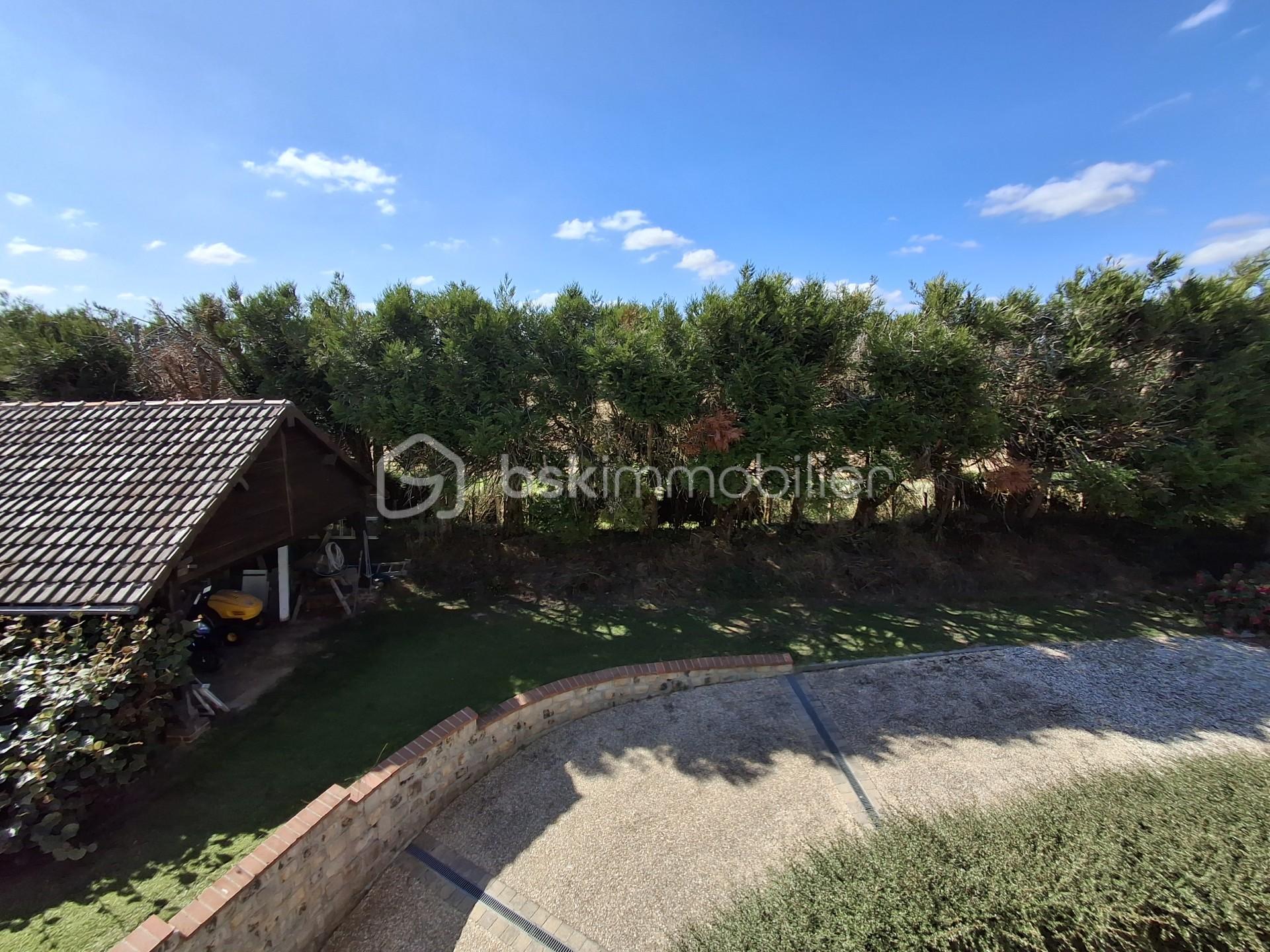 Maison de 120 m² - DESCENTE DE GARAGE PAYSAGE.jpg
