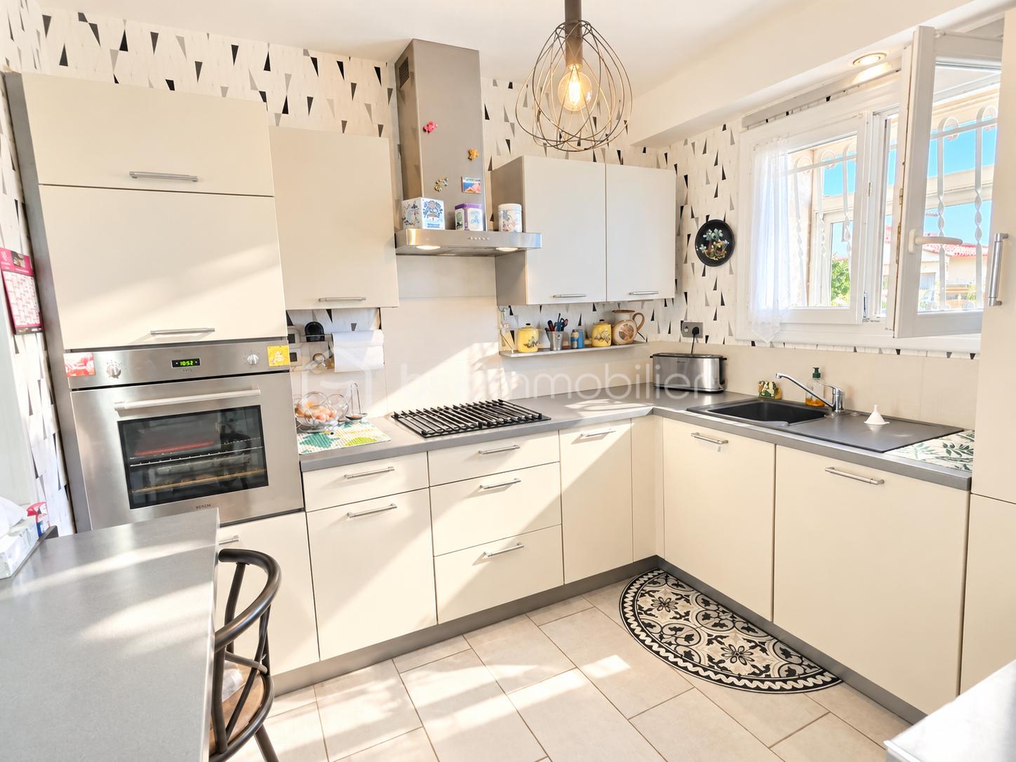 Sunlit Modern L-Shaped Kitchen.png