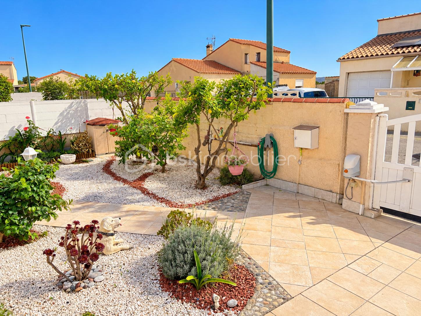 Sunlit Mediterranean Courtyard Garden.png