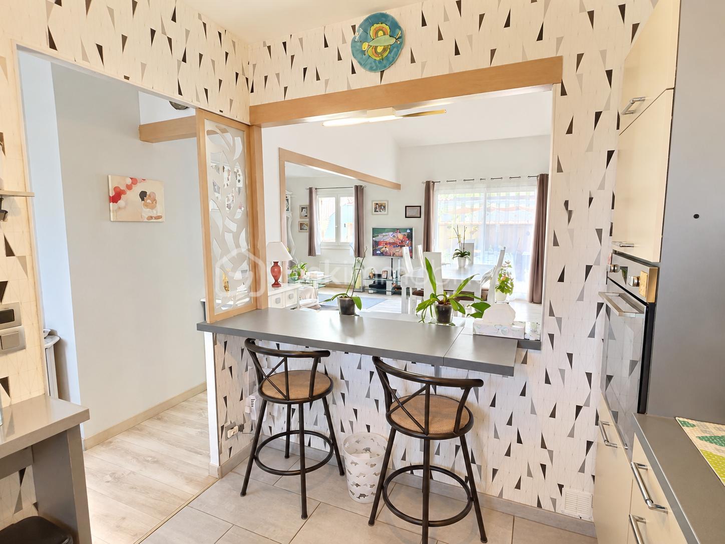 Sunlit Open-Plan Kitchen and Living Area.png