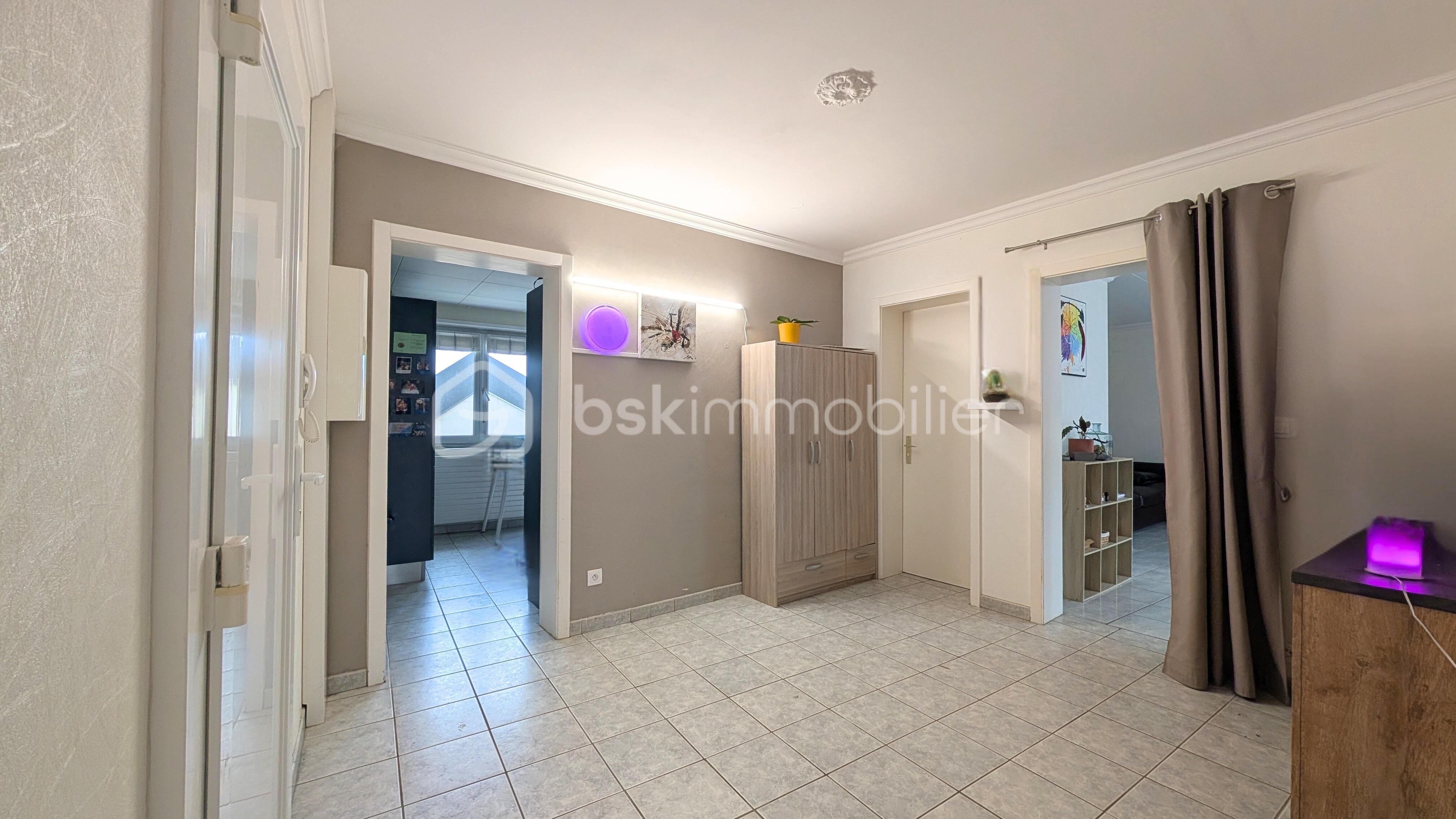 Appartement de 95 m² - Entrée Justine Grégory SONRIER BSK MOG Immobilier.jpg