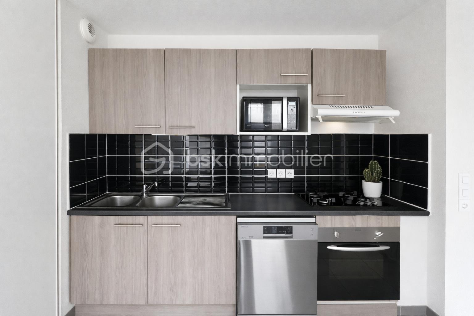 Appartement de 56,70 m² - 0E9105B3-5BF6-4988-9F5F-3A975F9388DE.png