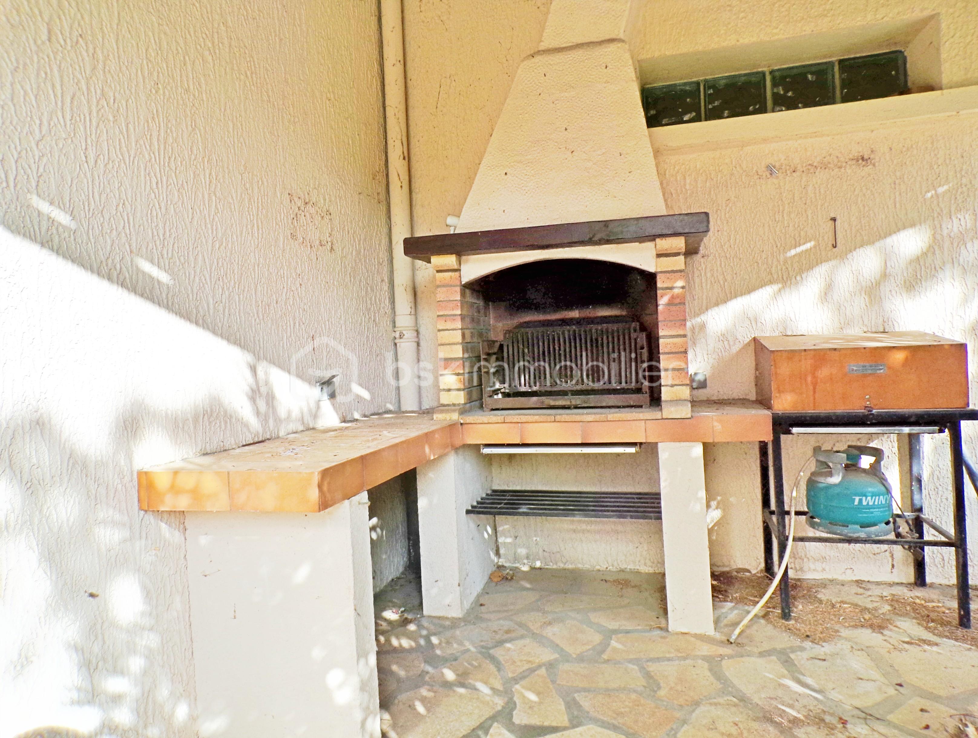 Maison traditionnelle de 197 m² - Coin BBQ.JPG