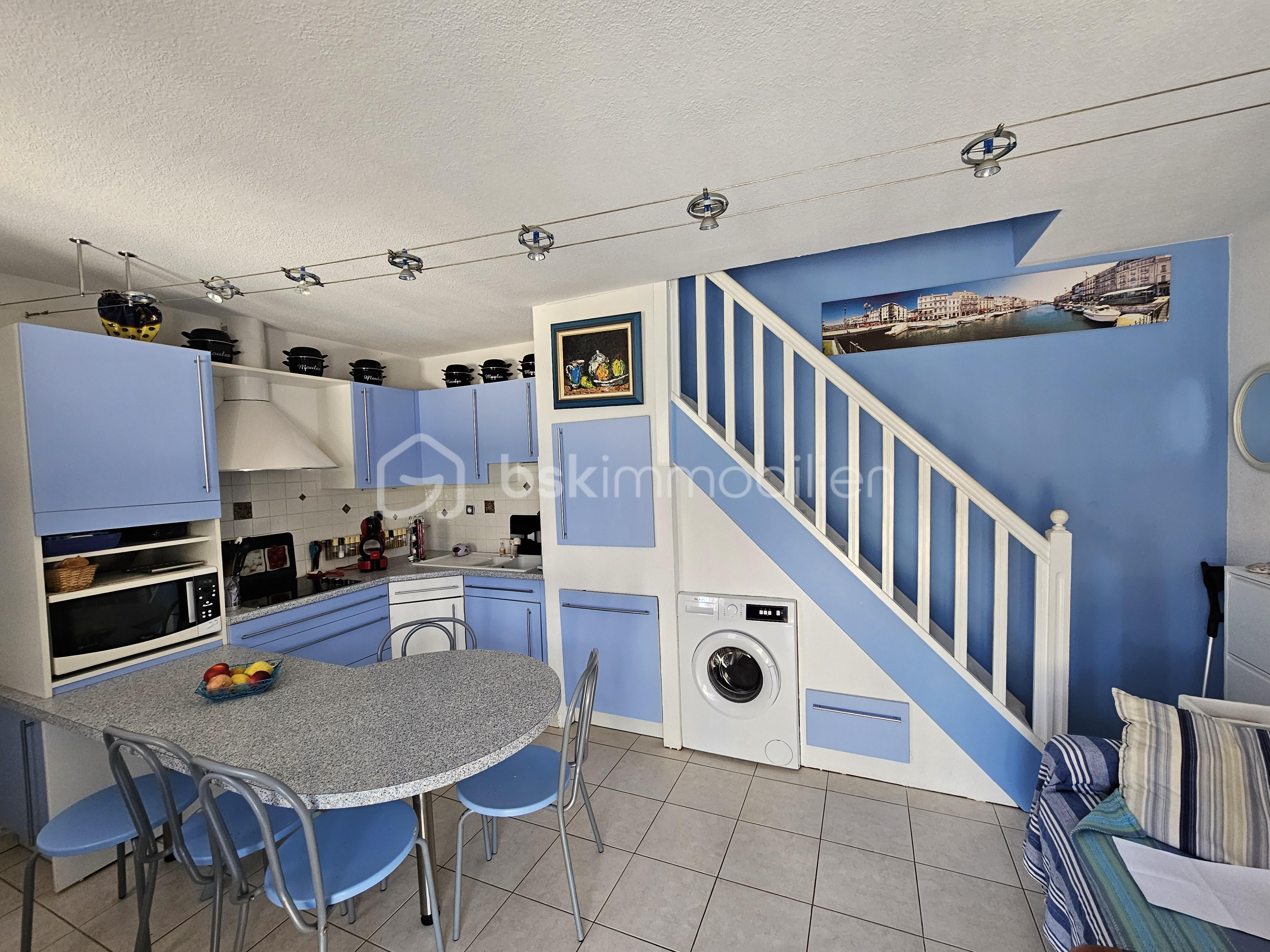 Maison de 32,32 m² - piece a vivre 2.jpg