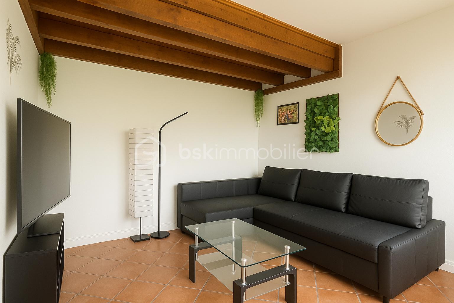 Duplex de 58 m² - Salon moderne avec touches naturelles.png