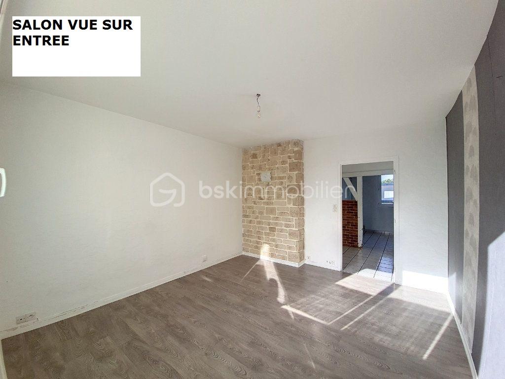 Appartement de 67,30 m² - SALON AUTRE VUE SUR ENTREE.jpg