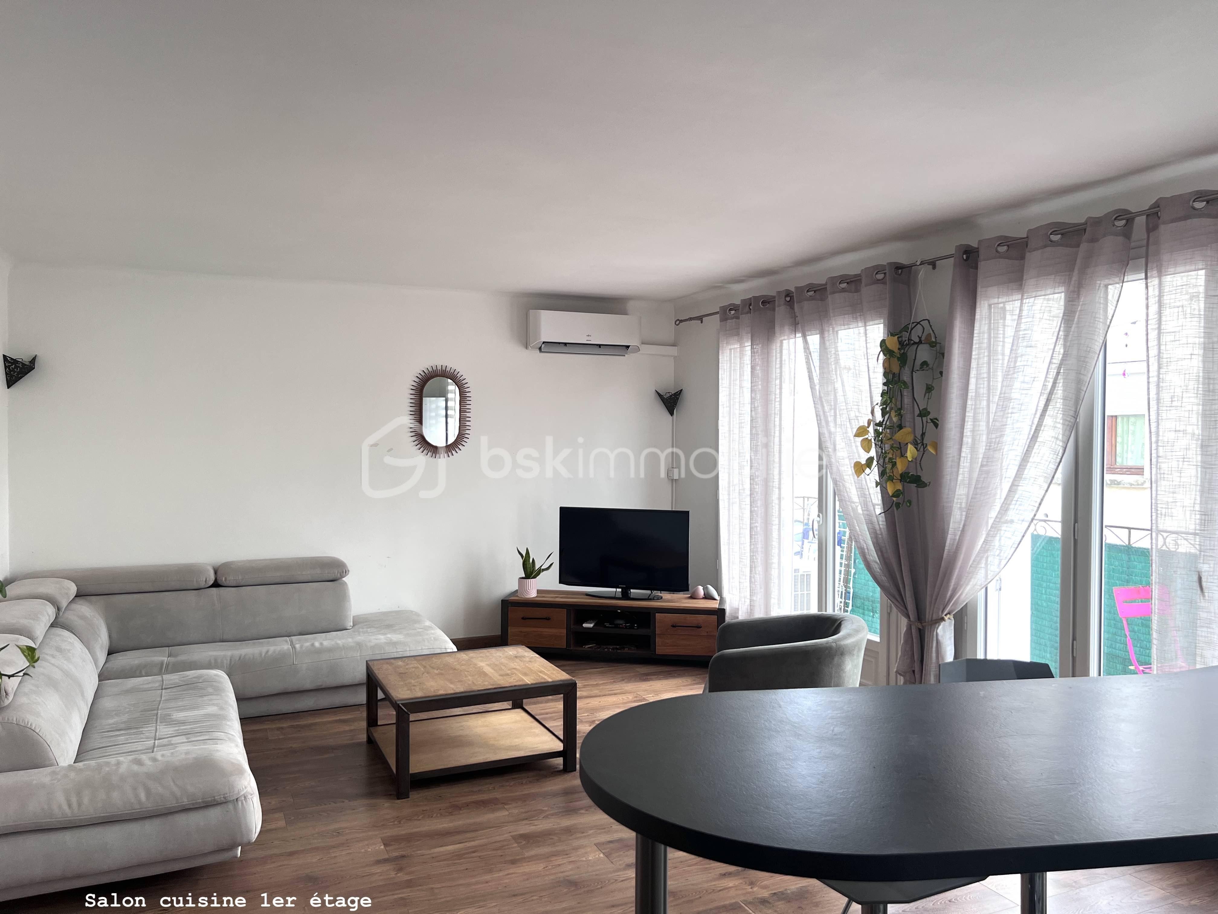 Maison de 152 m² - salon cuisine 1er .jpg
