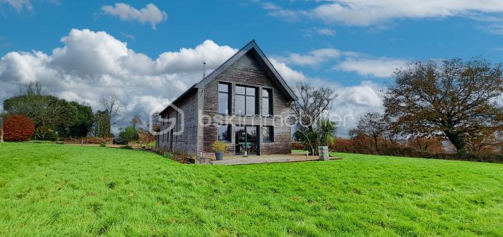 Maison contemporaine de 168 m² - pignon terrasse 2 ciel bleu.jpg