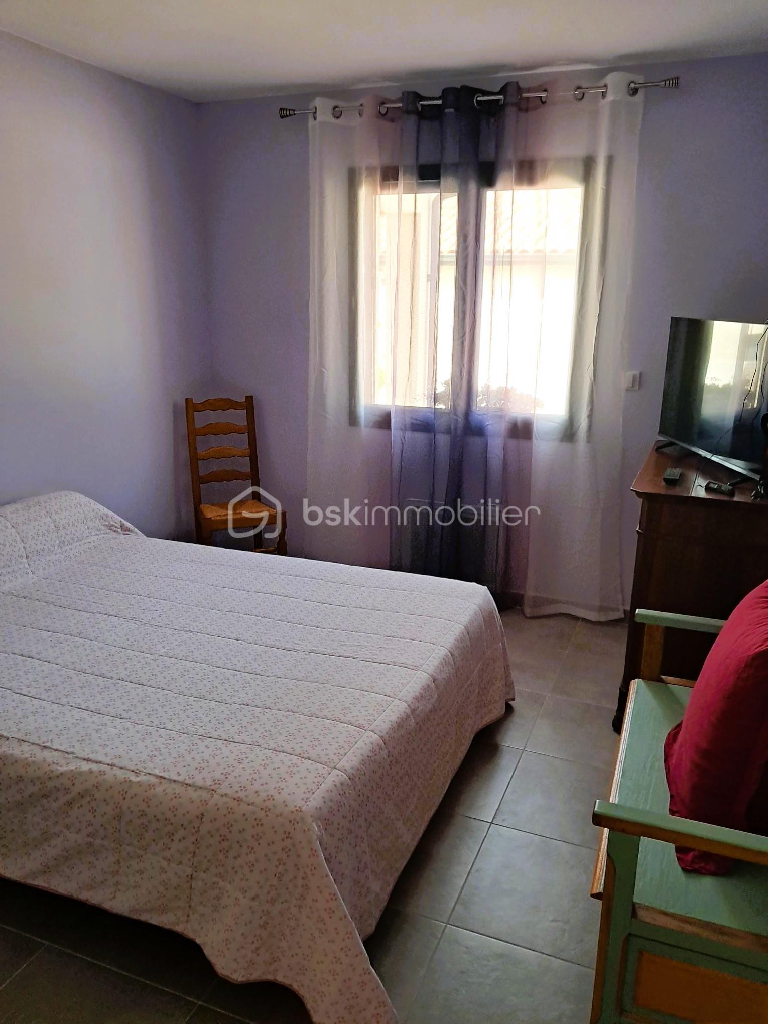 Maison traditionnelle de 59,42 m² - 04 - chambre.jpg