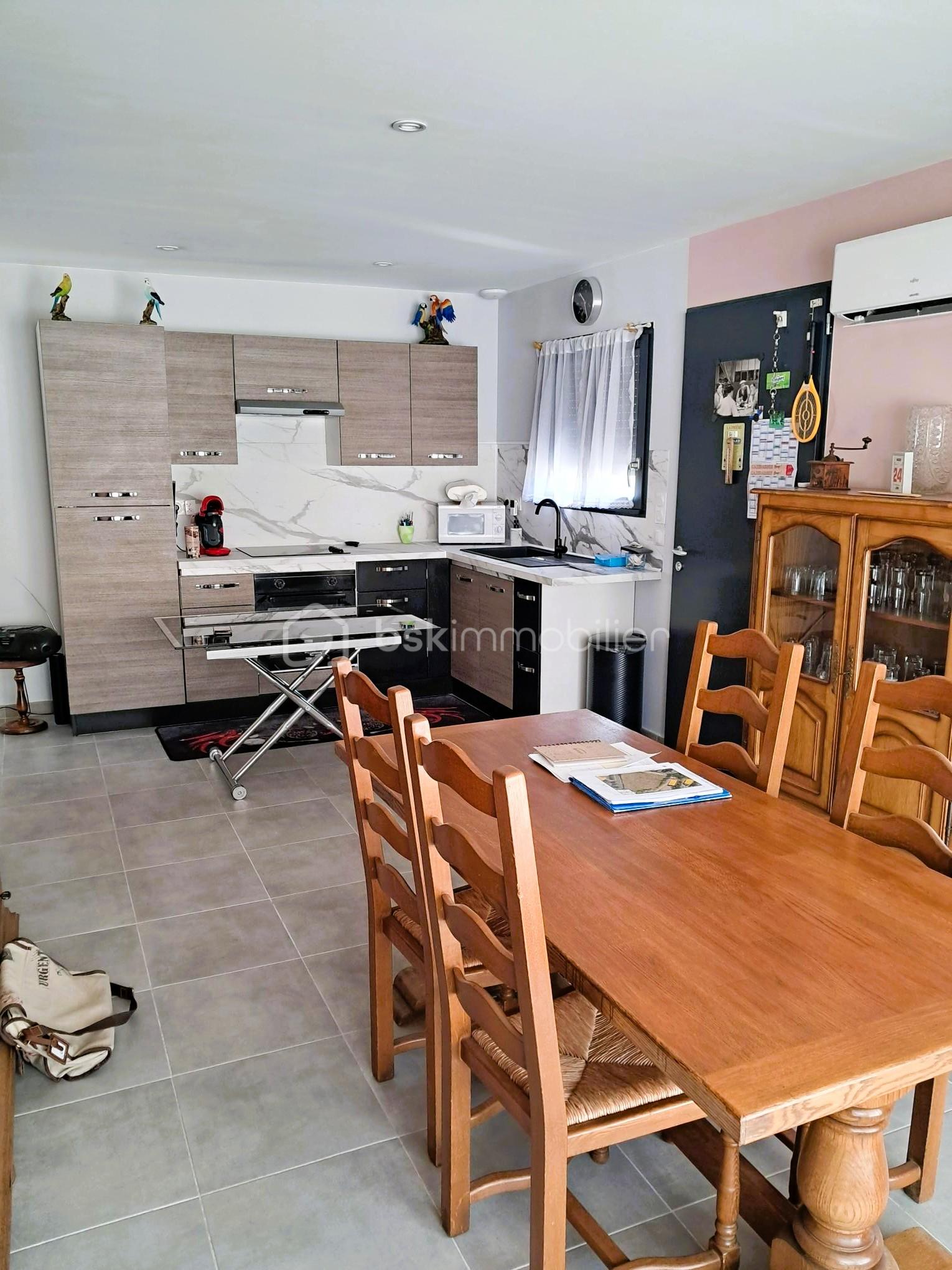 Maison traditionnelle de 59,42 m² - 09 - salon.jpg