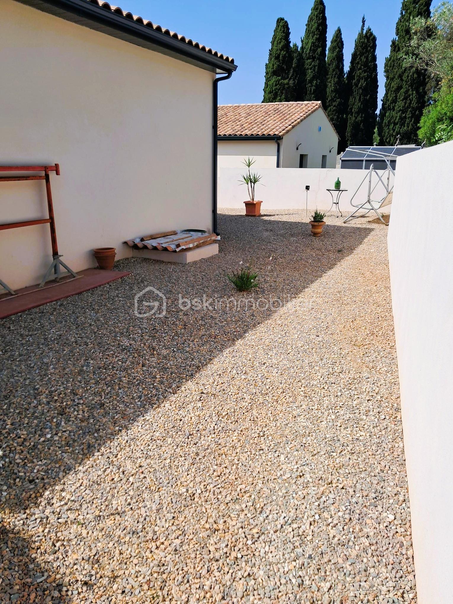 Maison traditionnelle de 59,42 m² - 13bis - arrière maison.jpg