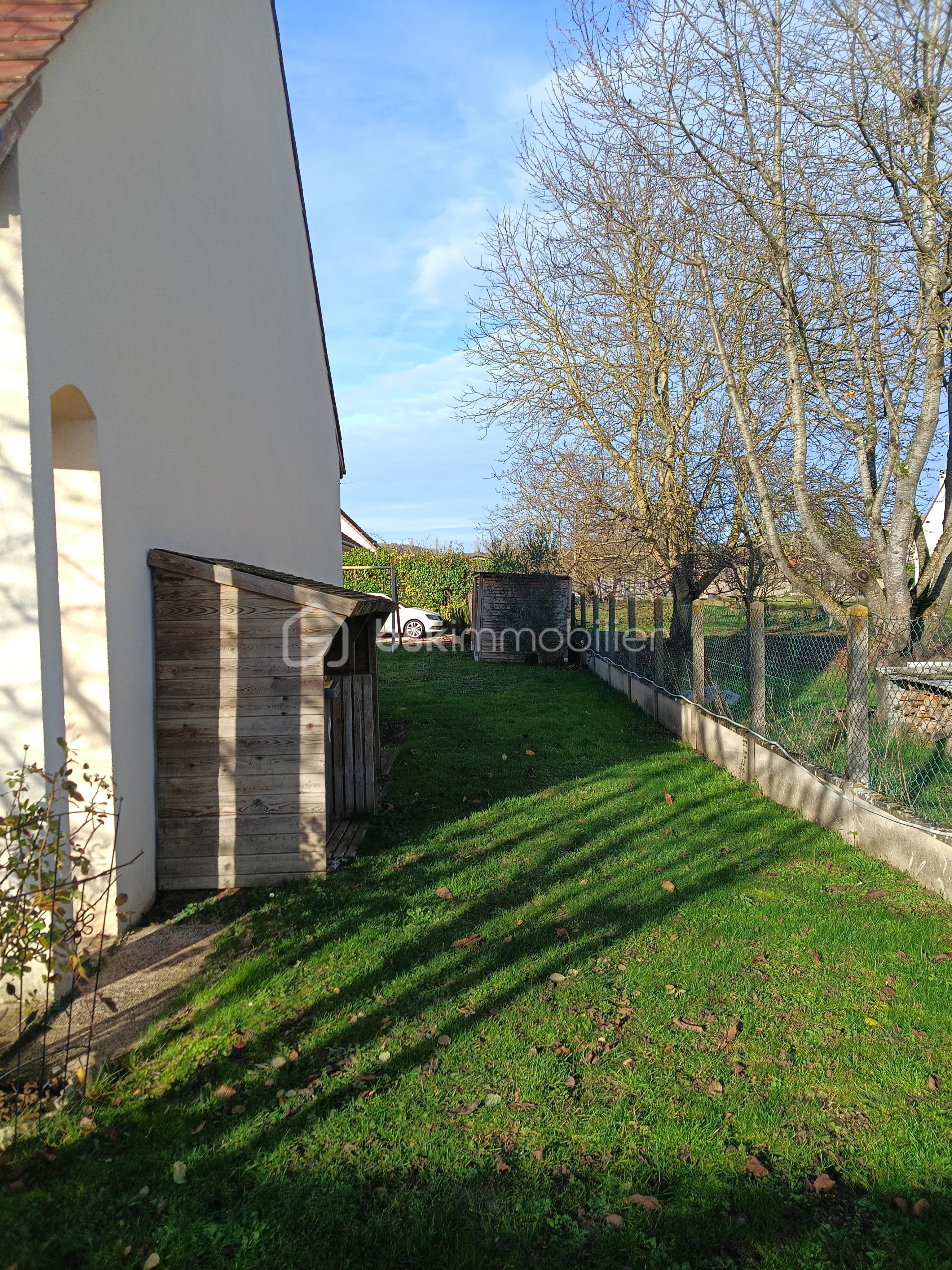 Maison de 126 m² - jardin cote.jpg