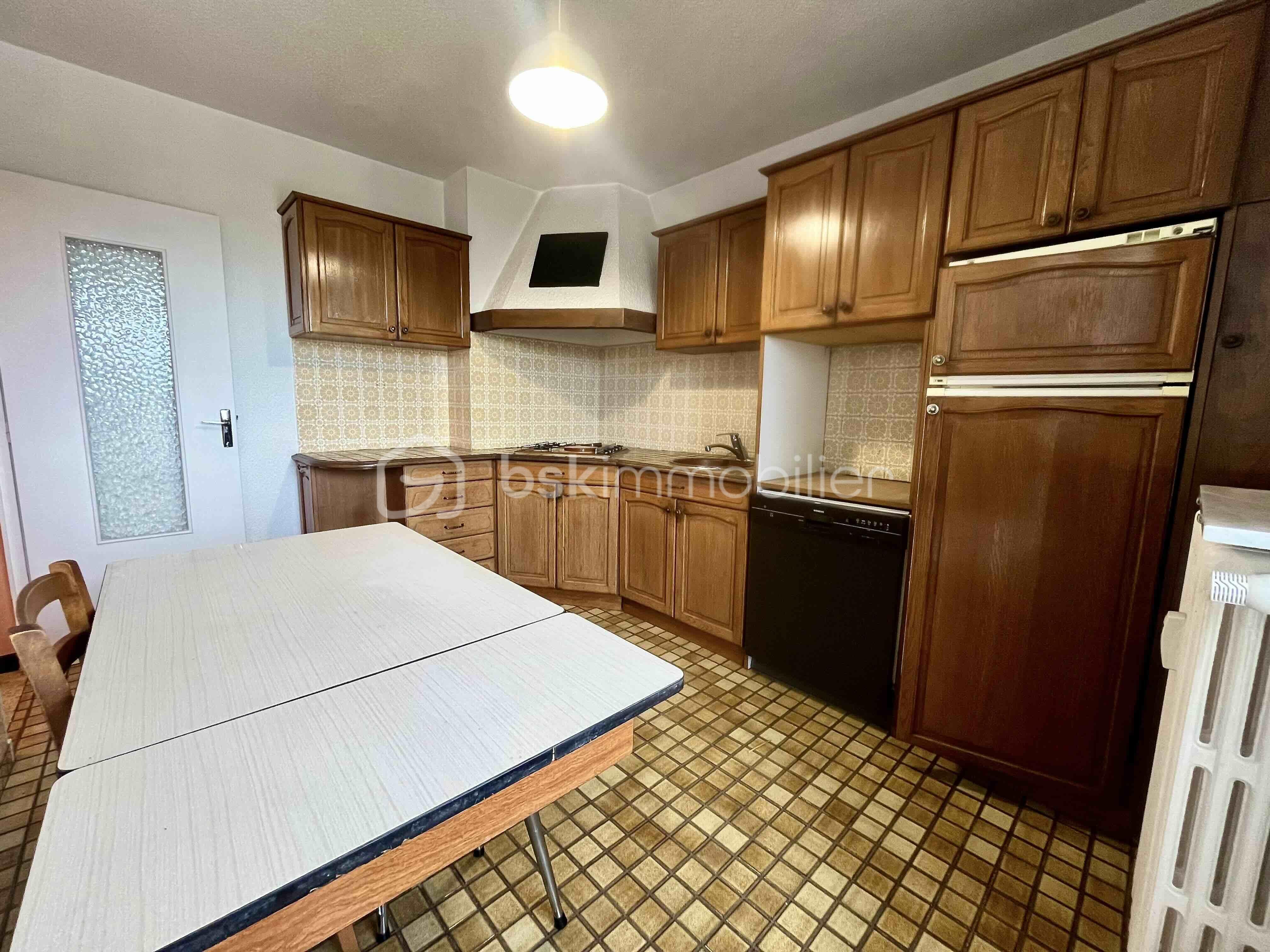 Appartement de 76,92 m² - 8-cuisine porte - copie.jpg