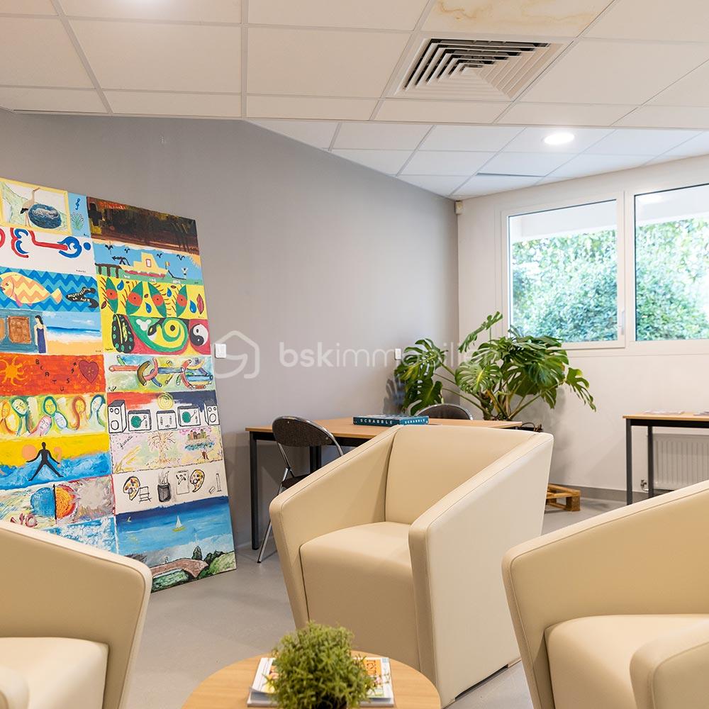 Appartement de 14,90 m² - 38-salon_des_familles-3.jpg