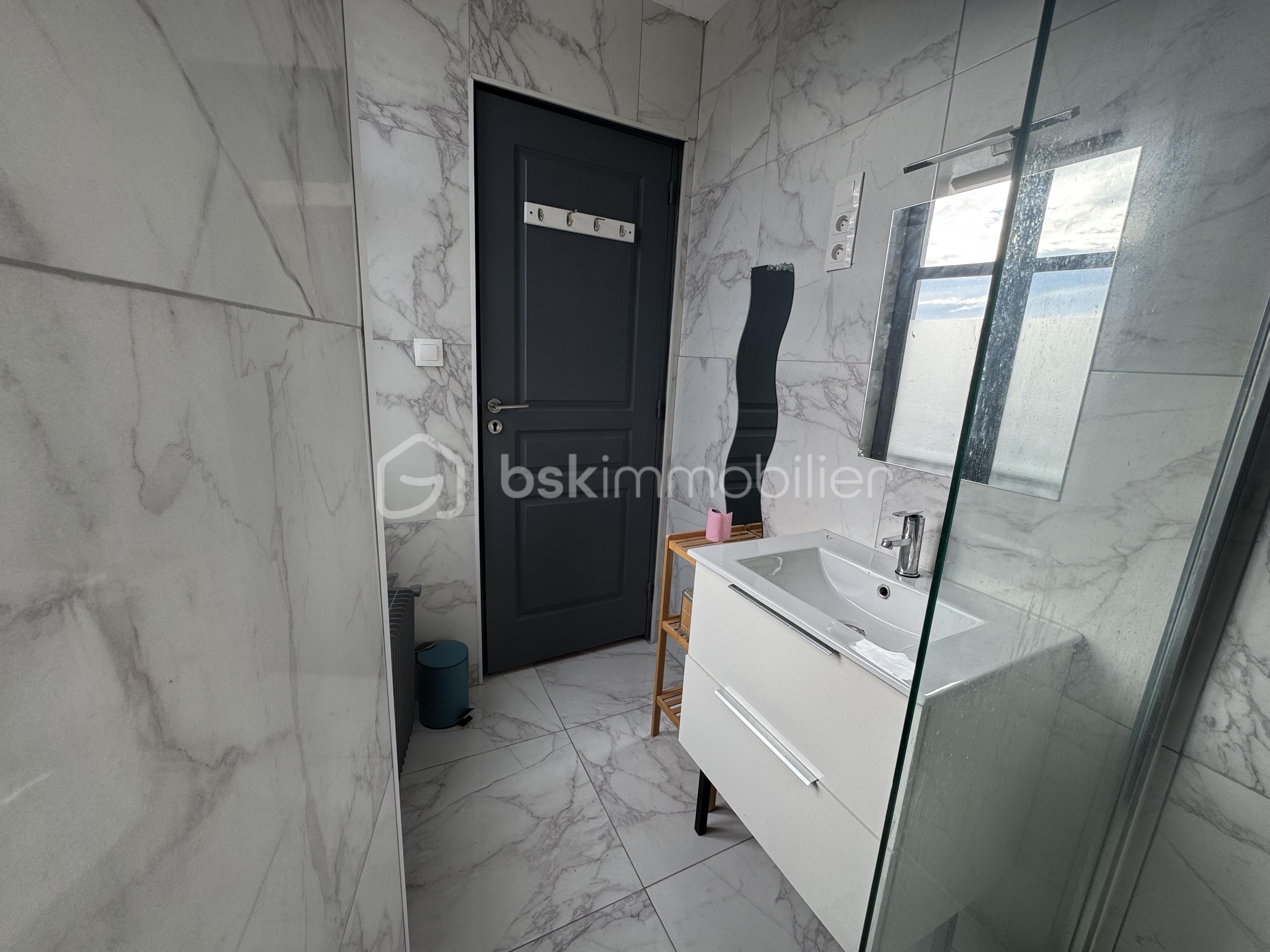 Appartement de 56,70 m² - SALLE DE BAIN DOS.jpg