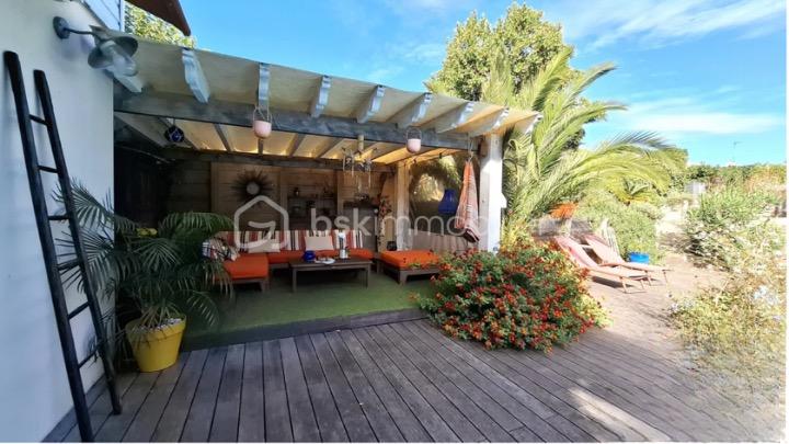 Maison de 134 m² - terrasse couverte.png