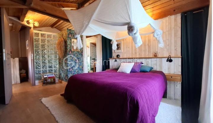 Maison de 134 m² - chambre cathy.png