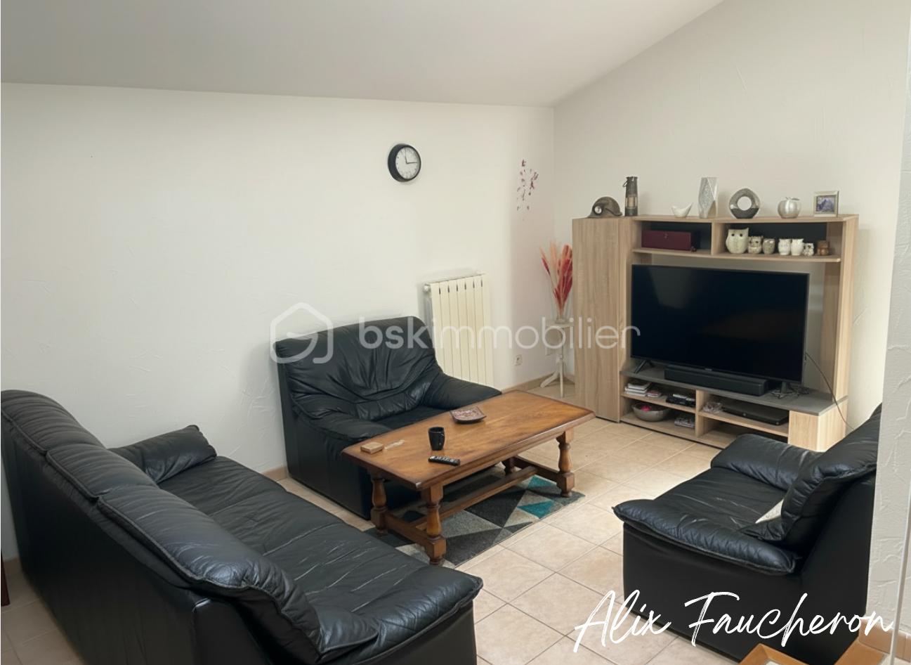 Maison traditionnelle de 145 m² - Salon okok.png