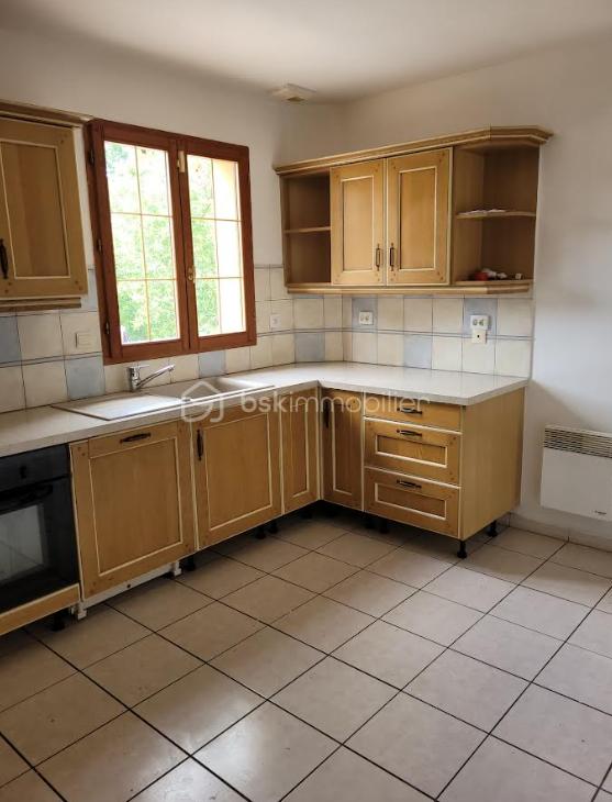 Maison de 110 m² - cuisine côté.png