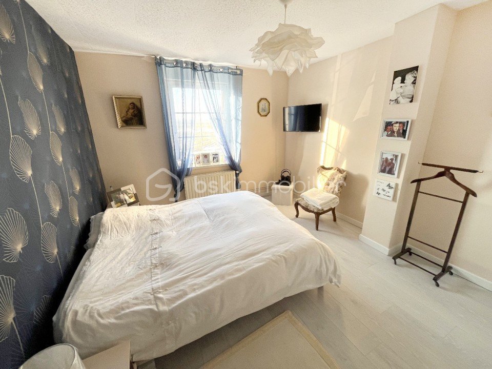 Immeuble mixte de 136 m² - chambre01