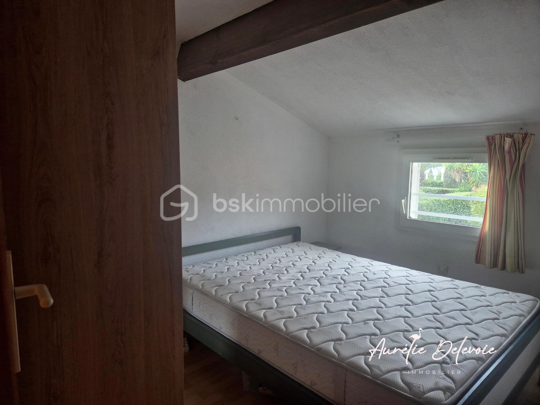 Maison de 29,70 m² - chambre.png